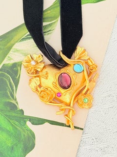 Pendentif miroir « Heart Flower » en améthyste et émeraude de Christian Lacroix Haute Couture
