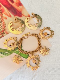 Christian Lacroix Iconic Large Gold Fire Flame Sun Drop Hoop Statement Set