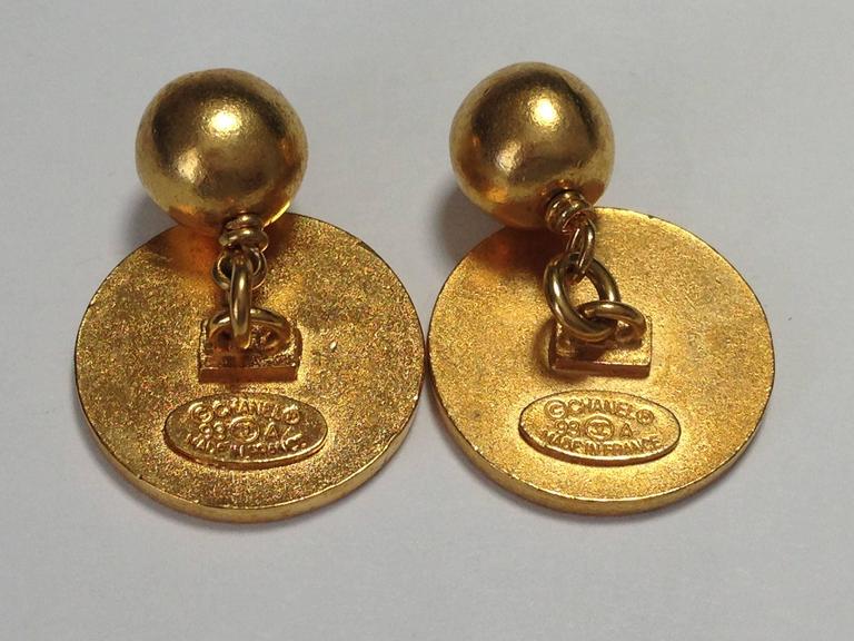 Vintage Chanel CC Logo 93A Black Gold Tone Cufflinks at 1stDibs