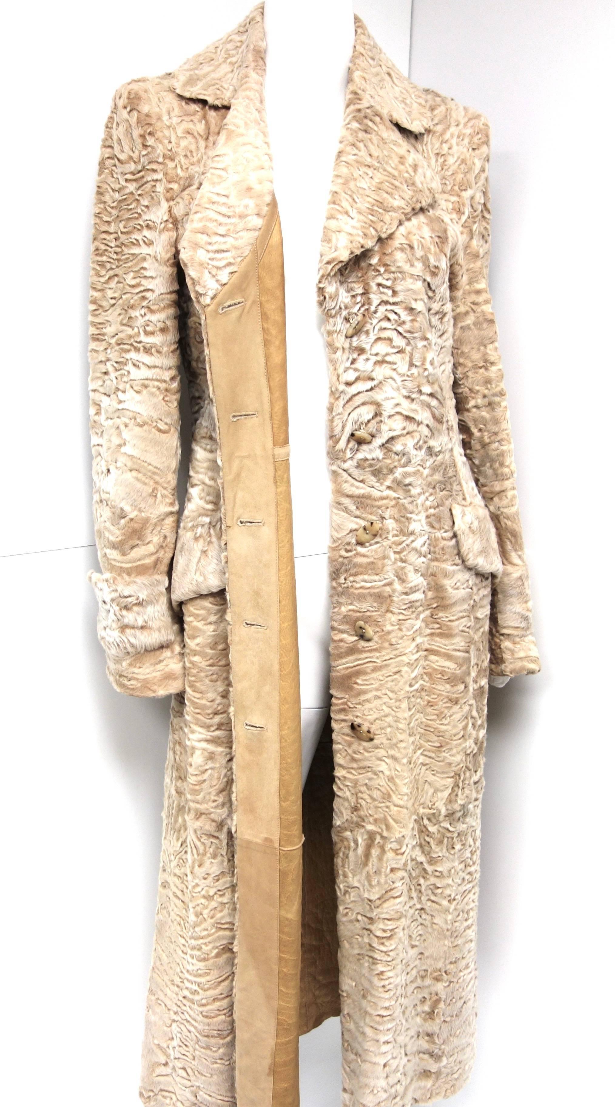Salvatore Ferragamo Persian Lamb Fur Full Length Leather Jacket 
Gorgeous color, amazing details. Signature Salvatore Ferragamo buttons. Two front side pockets.
Made in Italy
Size stated on label: 
I 42
US 8
F 40
D 38
Size runs small. Please