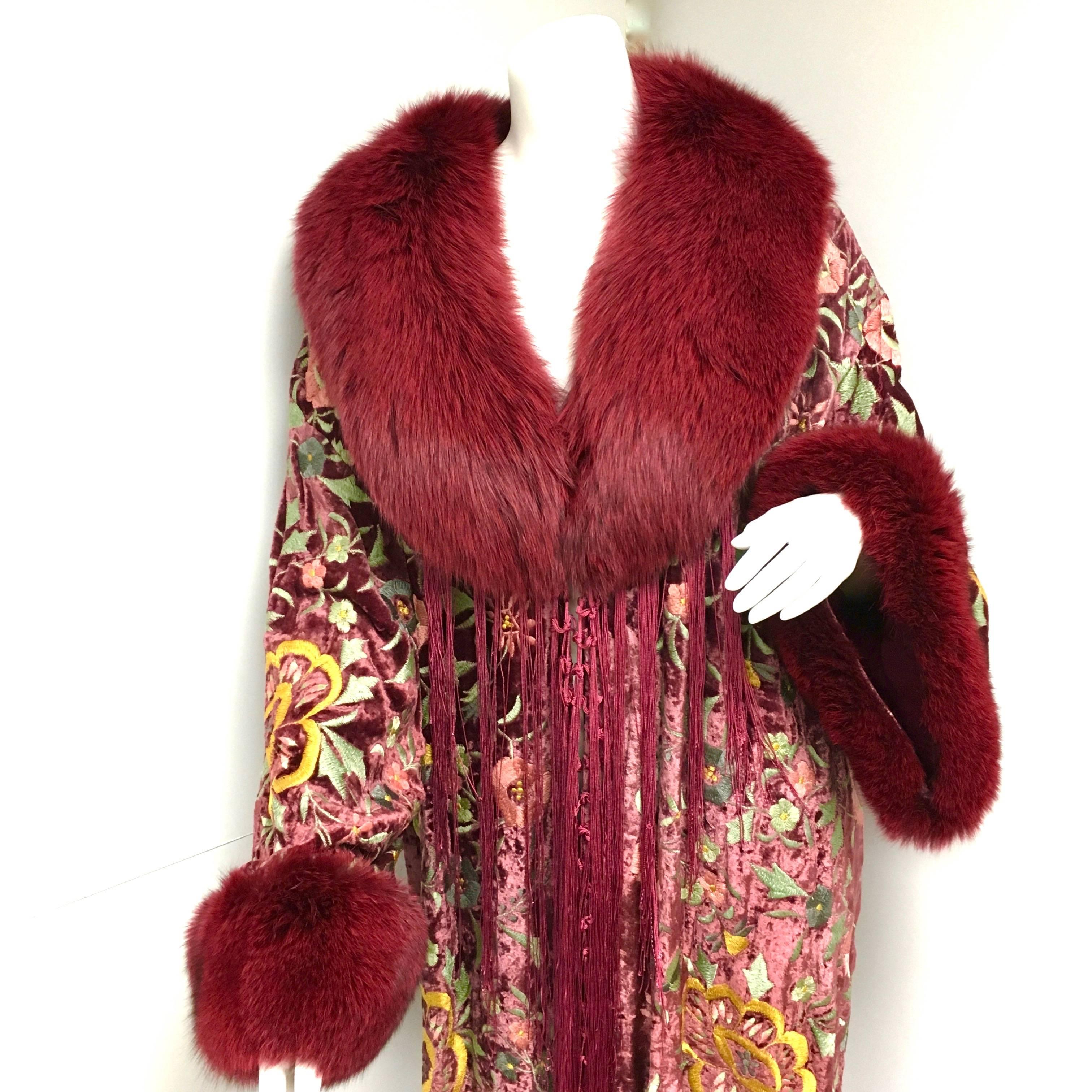 Gorgeous Adrienne Landau floral embroidered velvet Kimono Coat. Exquisitely detailed velvet coat with floral embroidery in shades of lavender, beige, and mint green on a light burgundy ground. The velvet is hand dyed with a beautiful luster and is