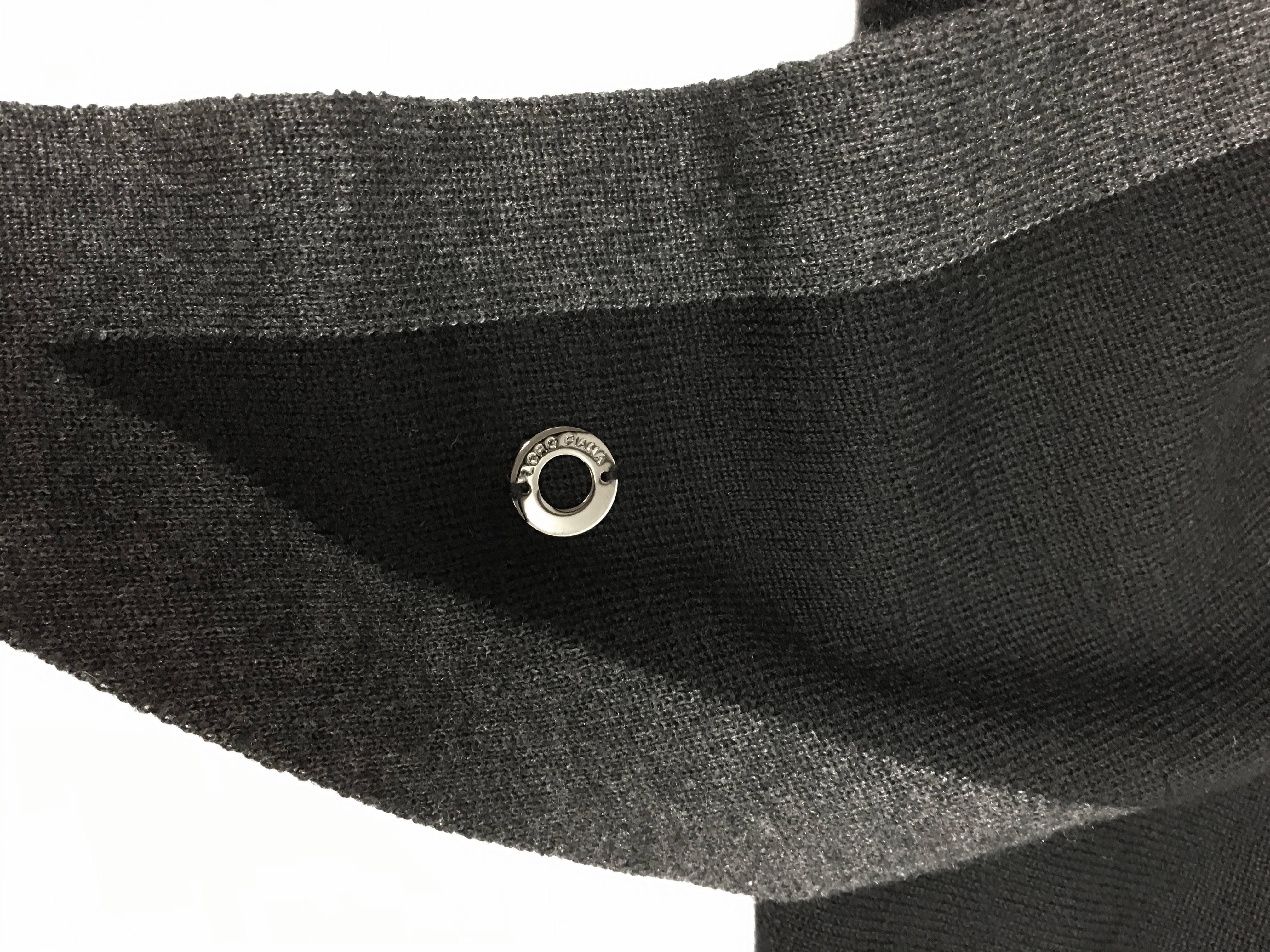 Loro Piana Scialle Twice Golden Knit Triangle Shawl
Color: Black/Gray
Retail: $1,075.00
Loro Piana cashmere-blend shawl.
Triangular: 90