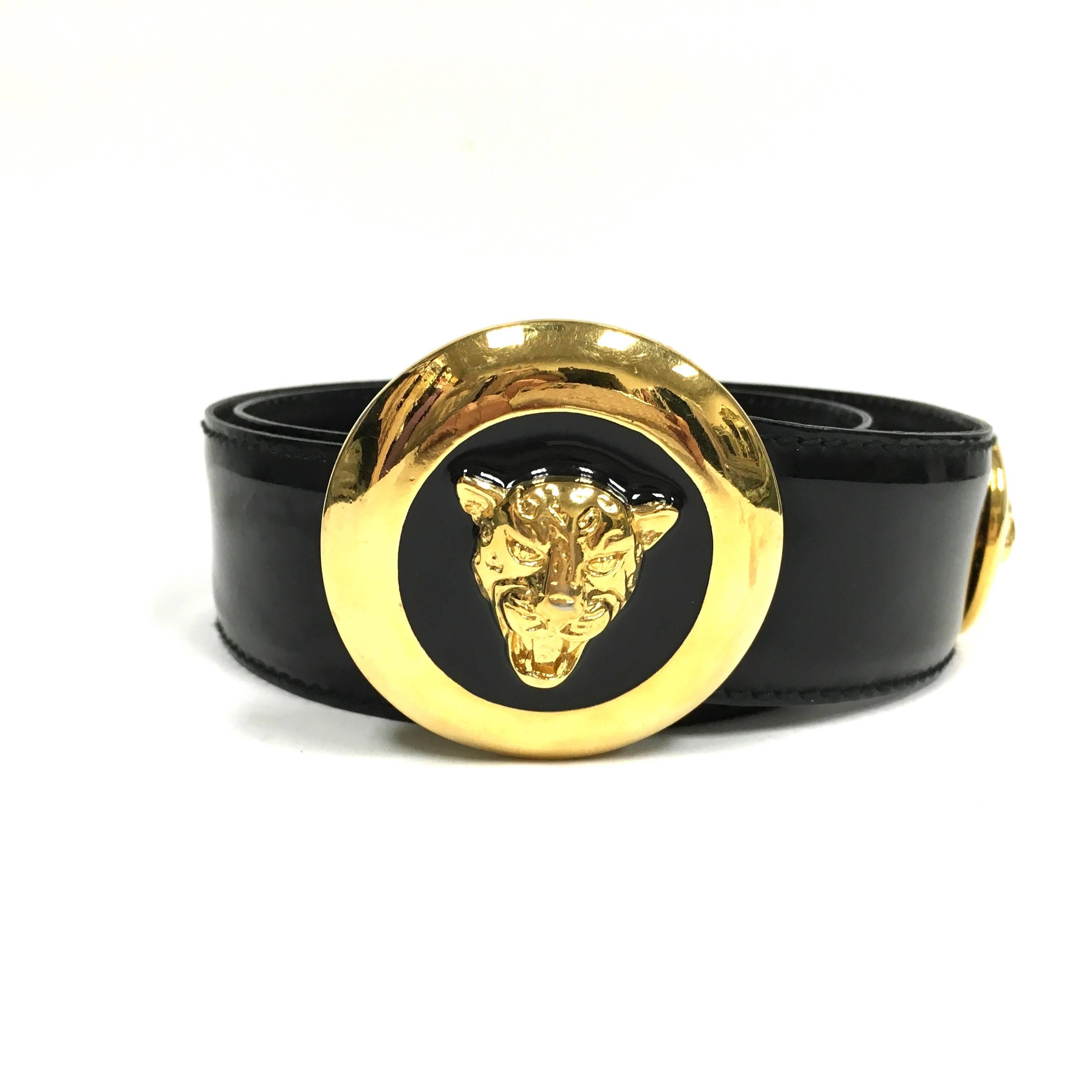 ESCADA Vintage Belt Black Patent Leather Gold Enamel Leopard Animal Charm 
Size: 80/34 XS
Made in Germany

Features adjustable size with 3 belt notches.
Color: Goldtone and black
Composition: Metal and leather
Closure/opening: Belt buckle and