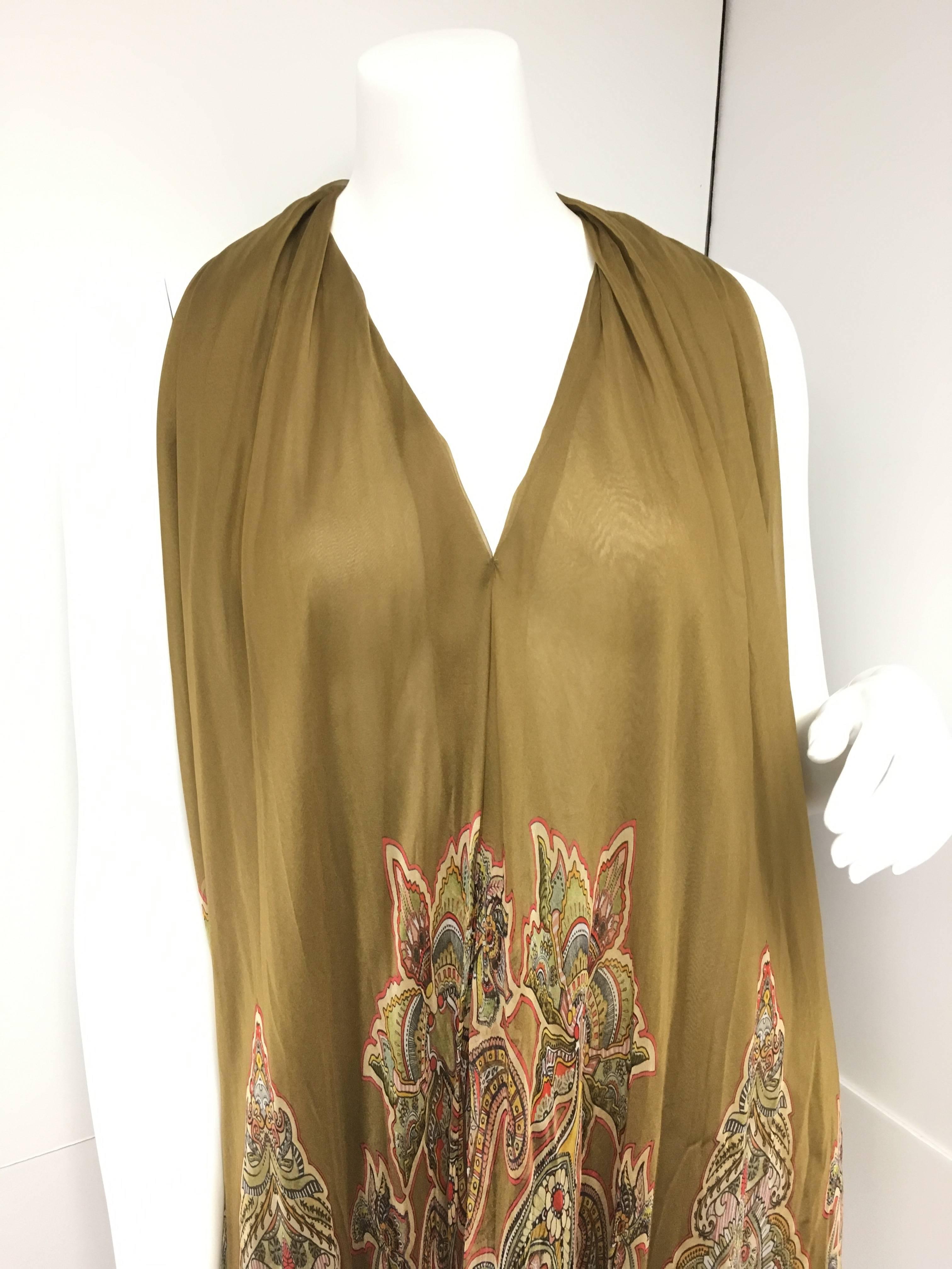 Gorgeous, feather weight semi-sheer pasley print silk-chiffon top from Alexander McQueen. Gathered across shoulders, double-layered, draped throughout, waterfall hem. Slips on. 100% Silk. Dry clean. Italian sizing. Fits true to size. Loose style.
