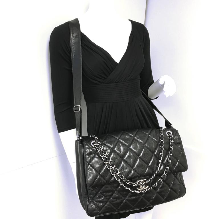 CHANEL Black Quilted Caviar Spirit Maxi Messenger Bag at 1stDibs