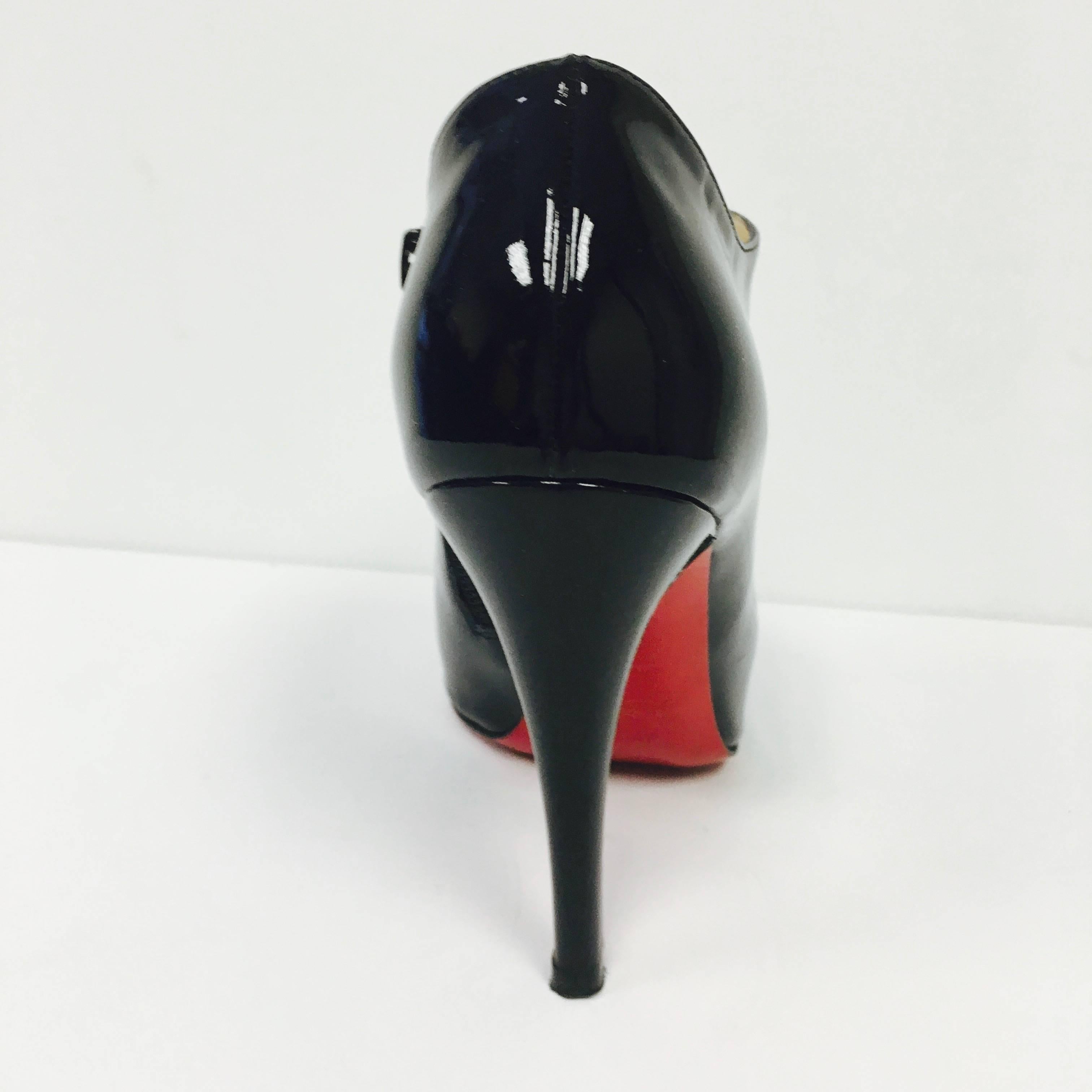 Women's CHRISTIAN LOUBOUTIN Black Patent Leather Christ 100 Lace Up Booties For Sale