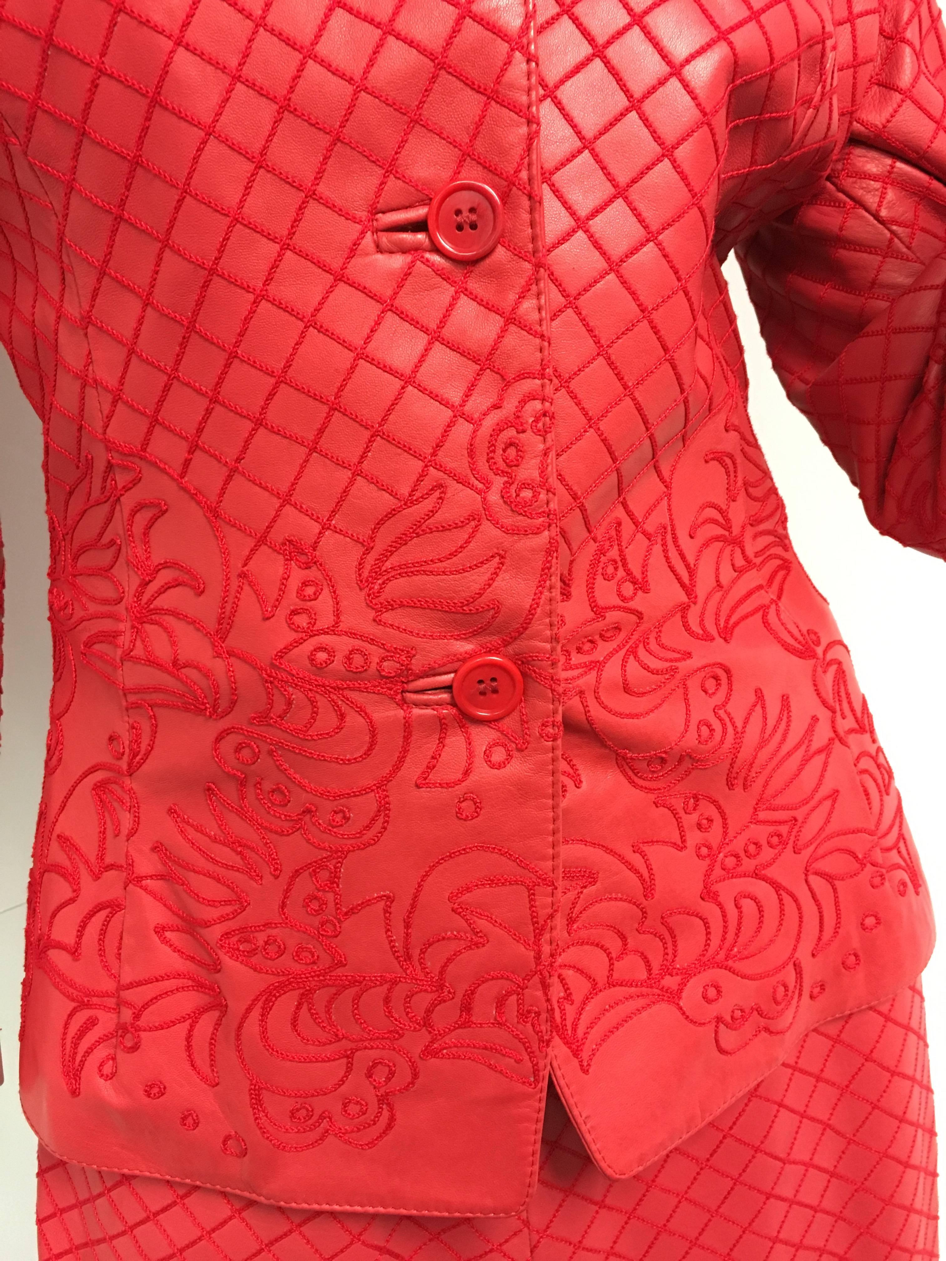 Rare Gianne Versace red leather suit with embroidered design throughout.
Size: Extra Small
Condition: Excellent