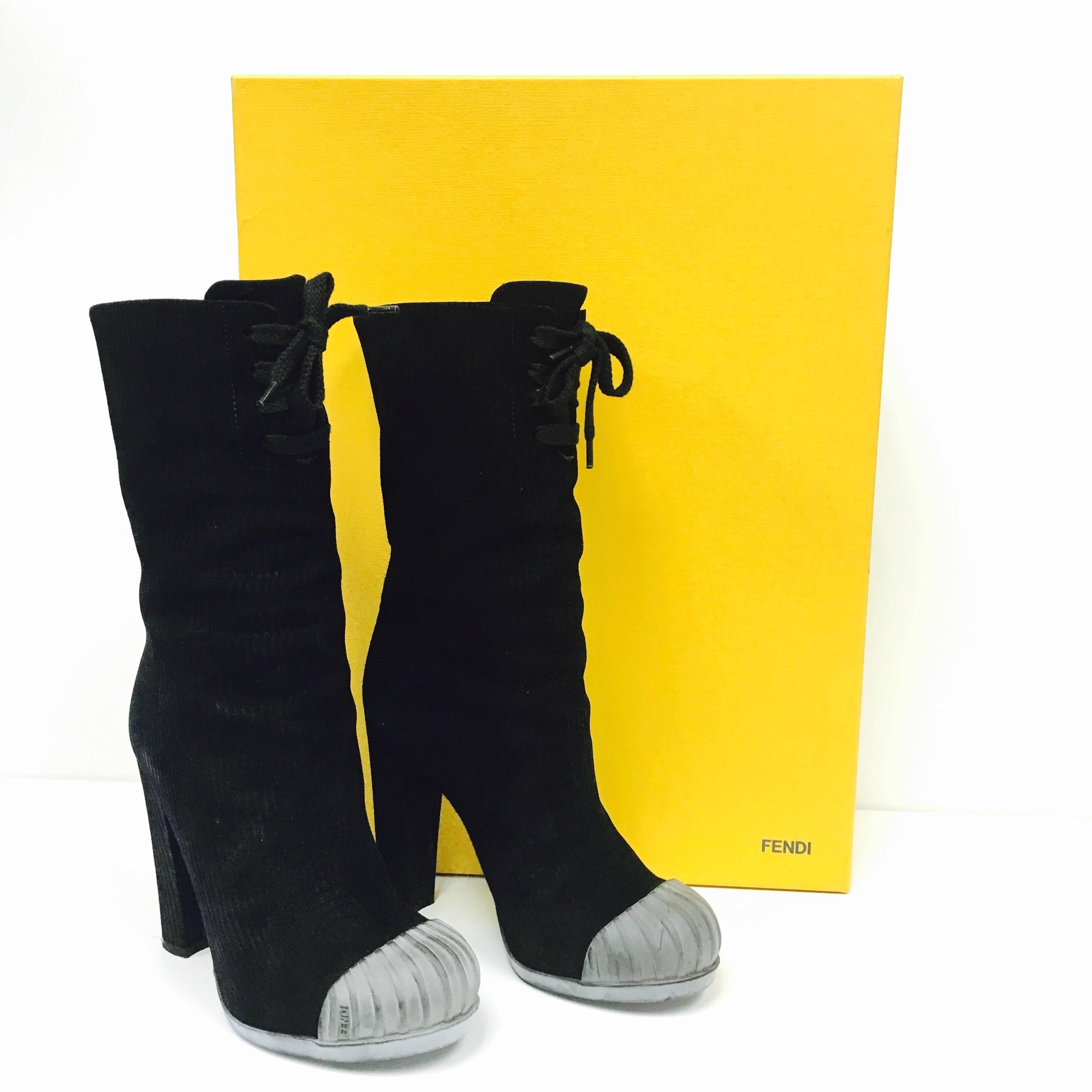 Fendi Fendishire Mid-Shaft Suede Rubber Cap Boots
Size 35​ ITA / 5 US
LIKE NEW. WORN ONCE. ORIGINAL BOX, EXTRA HEEL CAPS.
Retail: $990. Sold out. 
Black Fendi corduroy boots with rubber cap-toe and embossed logo on side,
tie closure at front