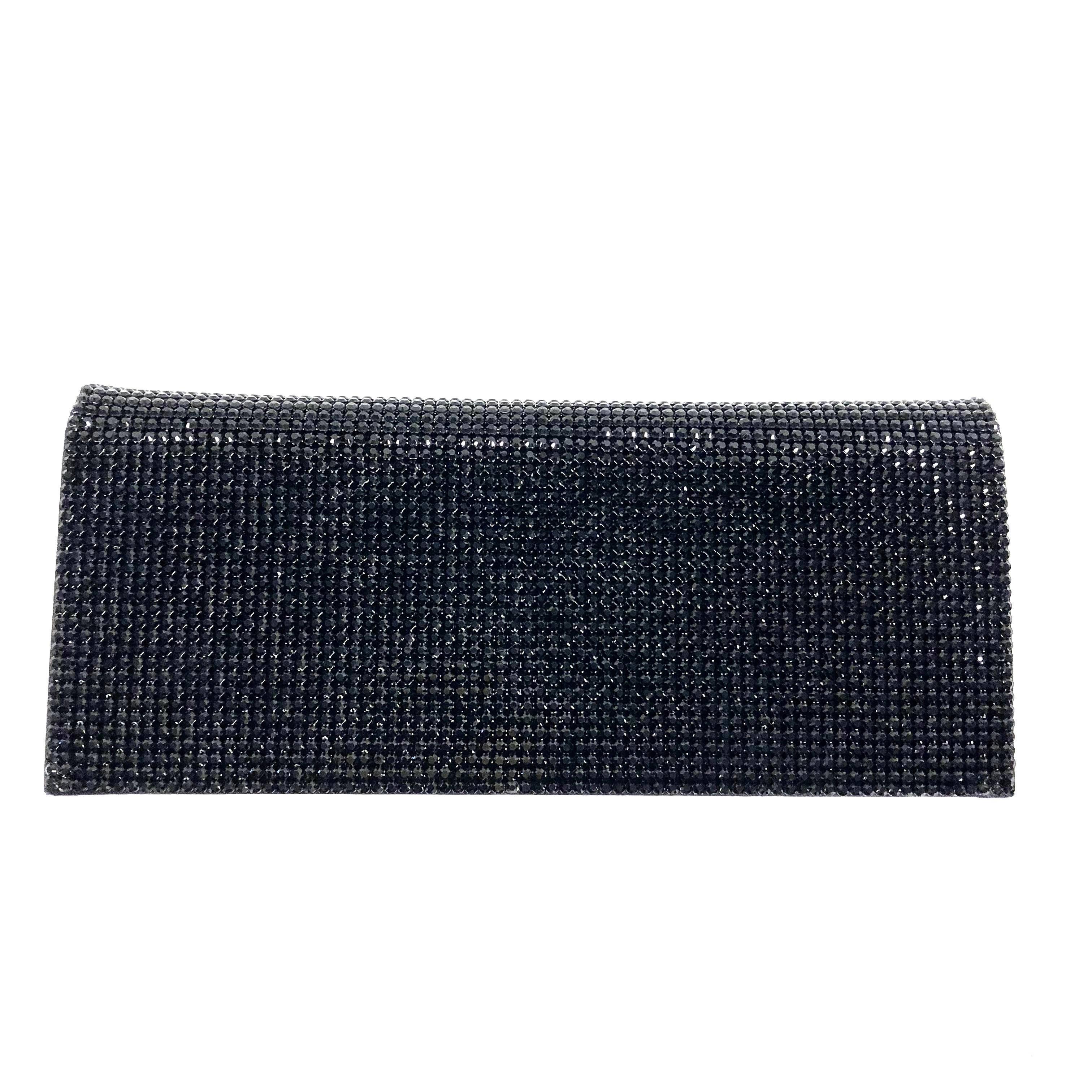 Gorgeous Escada evening bag covered with black crystals. Blsck metal chain strap. Can be used as a clutch. 