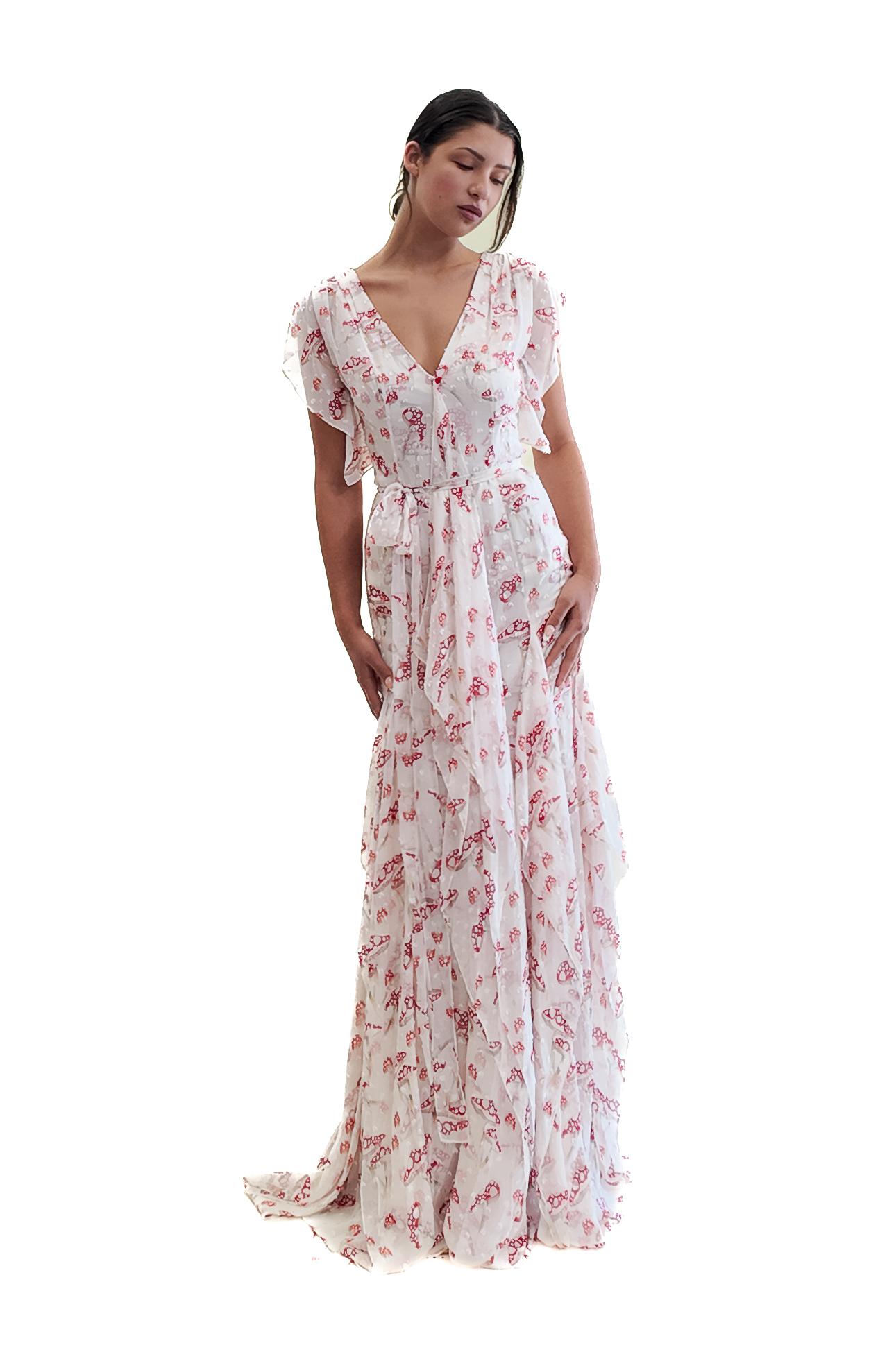 Rehaussez votre garde-robe de vacances ou votre tenue de mariage à destination avec la robe en soie imprimée champignon Carolina Herrera Cruise 2012. Confectionnée dans un luxueux tissu texturé en soie, cette robe offre un drapé sophistiqué et un