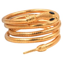 Braccialetto/collana a forma di serpente in oro flessibile