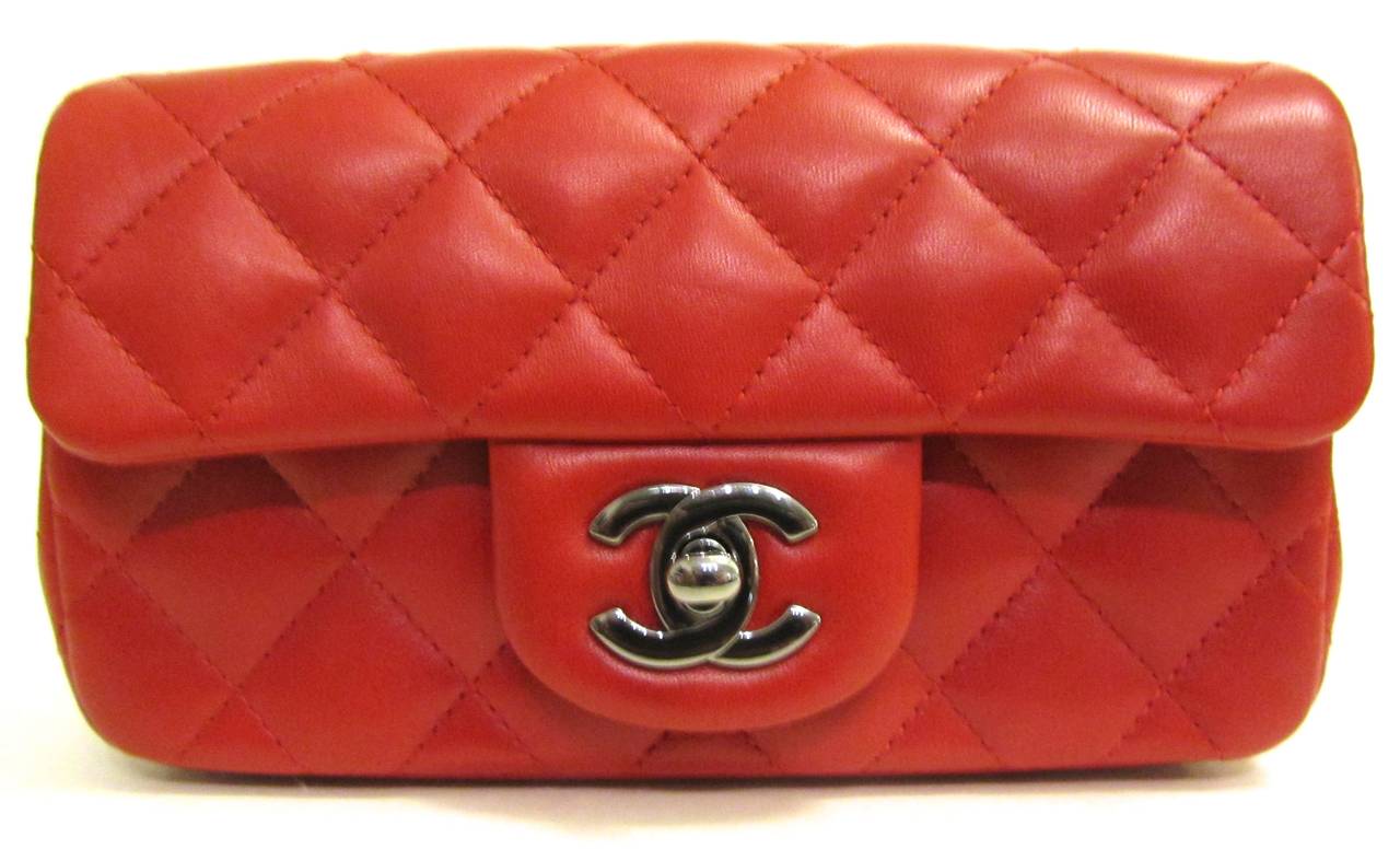 New in box Chanel, red, lambskin leather. Mini classic. A true gem. Hard to find.