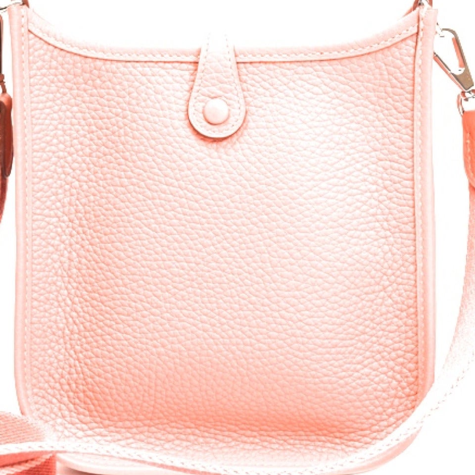 Beautiful Mini Evelyne shoulder bag in Sakura rose clemence leather. This model is from 2015 and is extremely difficult to find and is in very high demand. Comes with removable strap with palladium hardware. Beautifully crafted. 

Gorgeous color