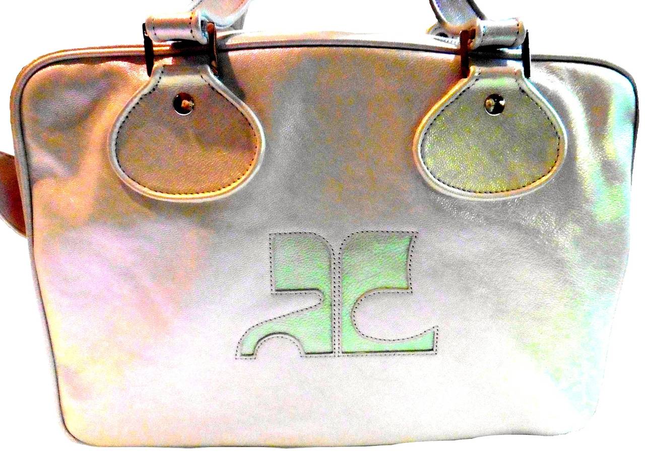 New beautiful pearlescent gray purse tote bag from Courreges of Paris. Stunning bag that is perfect for all occasions and matches absolutely everything. Opalescent light grey leather with shimmer. 

More pictures available upon