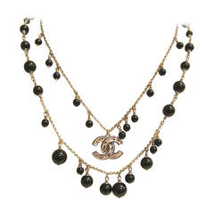 Chanel Necklace - Double Strand Alternating Black Beads - CC Logo