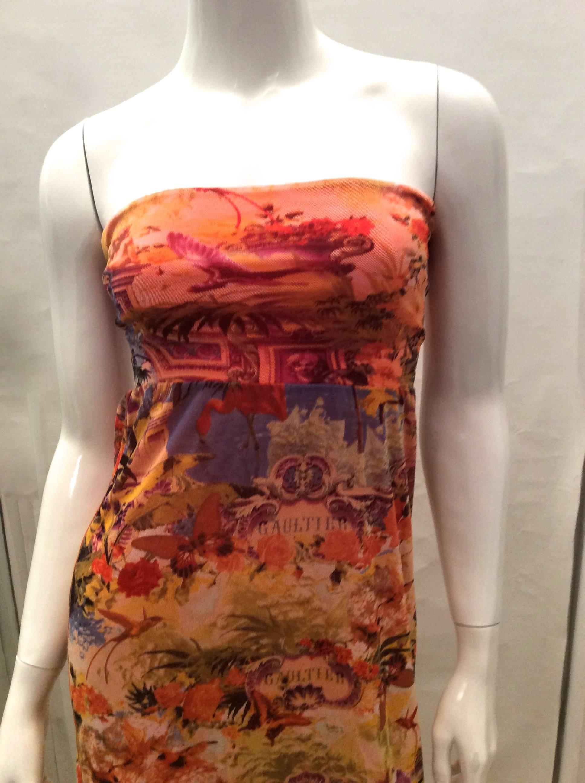 This Gautier Floral Mesh Size Small is a fabulous summer skirt or a halter dress. Can be worn to the beach or on a lovely summer afternoon. The typical mesh Gautier print encompasses butterflies, vases, floral arrangements, Gautier signature,