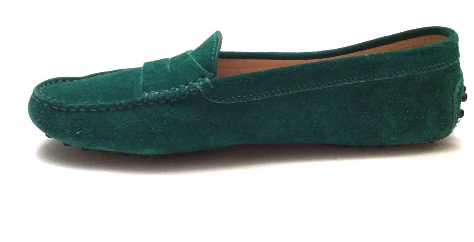 New in box, Tod's. Malachite green size 37 suede driving loafers with rubber sole. 