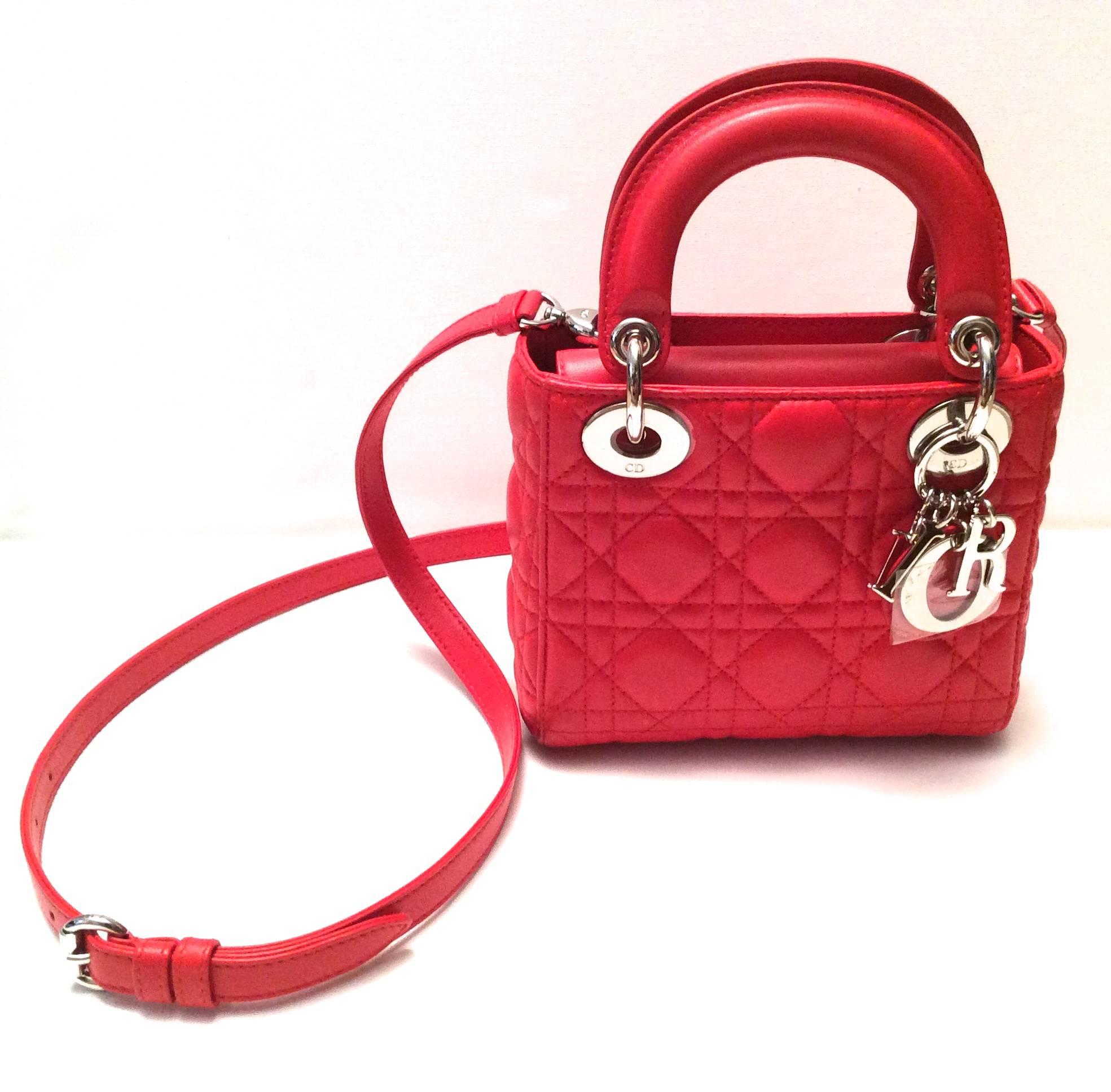 This Mini Lady Dior bag is one of the most sought after bags from Dior. This particular color is one of the most desired colors and is extremely hard to find due to its popularity. The inside is lined in fabric with the signature Dior thatch design