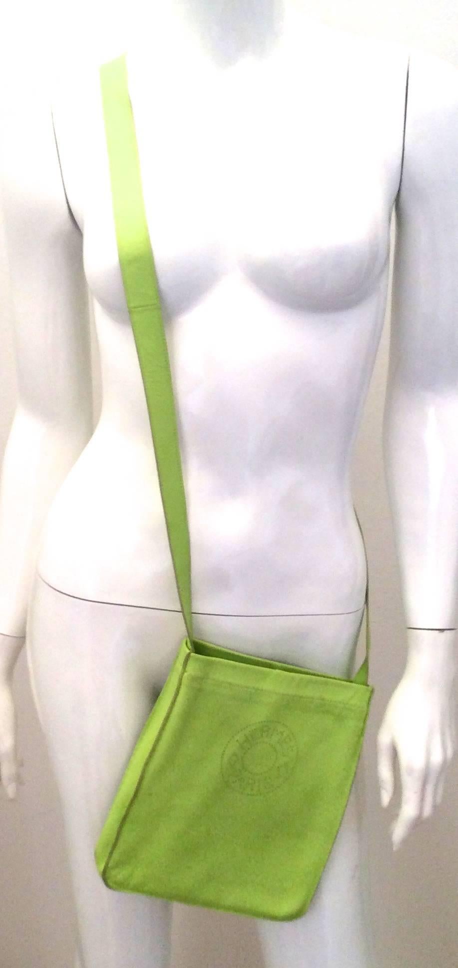 Presented here is a beautiful crossbody bag from Hermes Paris. The style of the bag is called the 'toudou' bag. This model is no longer produced and is extremely rare. Production was stopped in mid-2000's. The front of the bag has a perforated