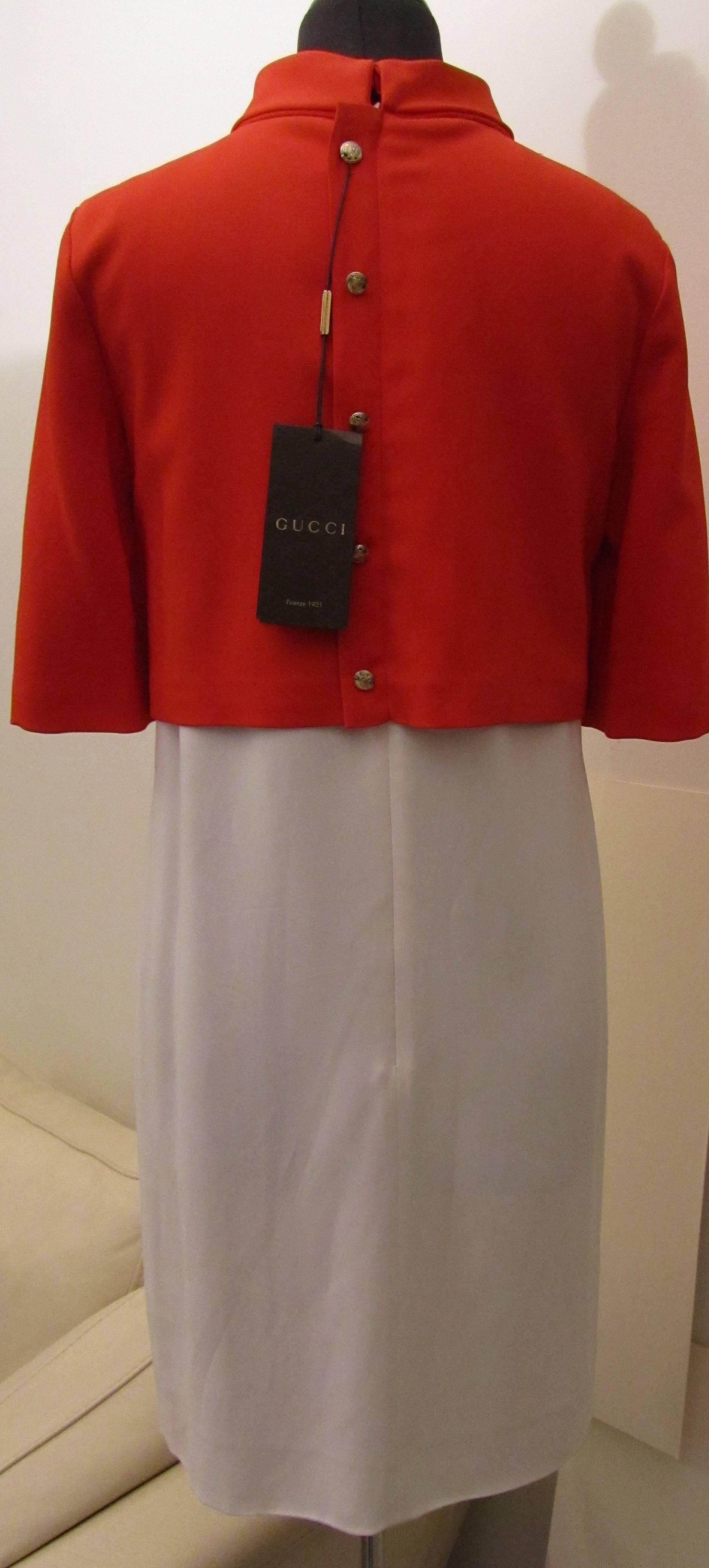 Presented here is a new dress from Gucci. The dress is a size Italian 42 which is equivalent to a USA size 2 to 6. Pay close attention to the measurements. The dress still has its original tags on it and has never been worn. The dress has a white
