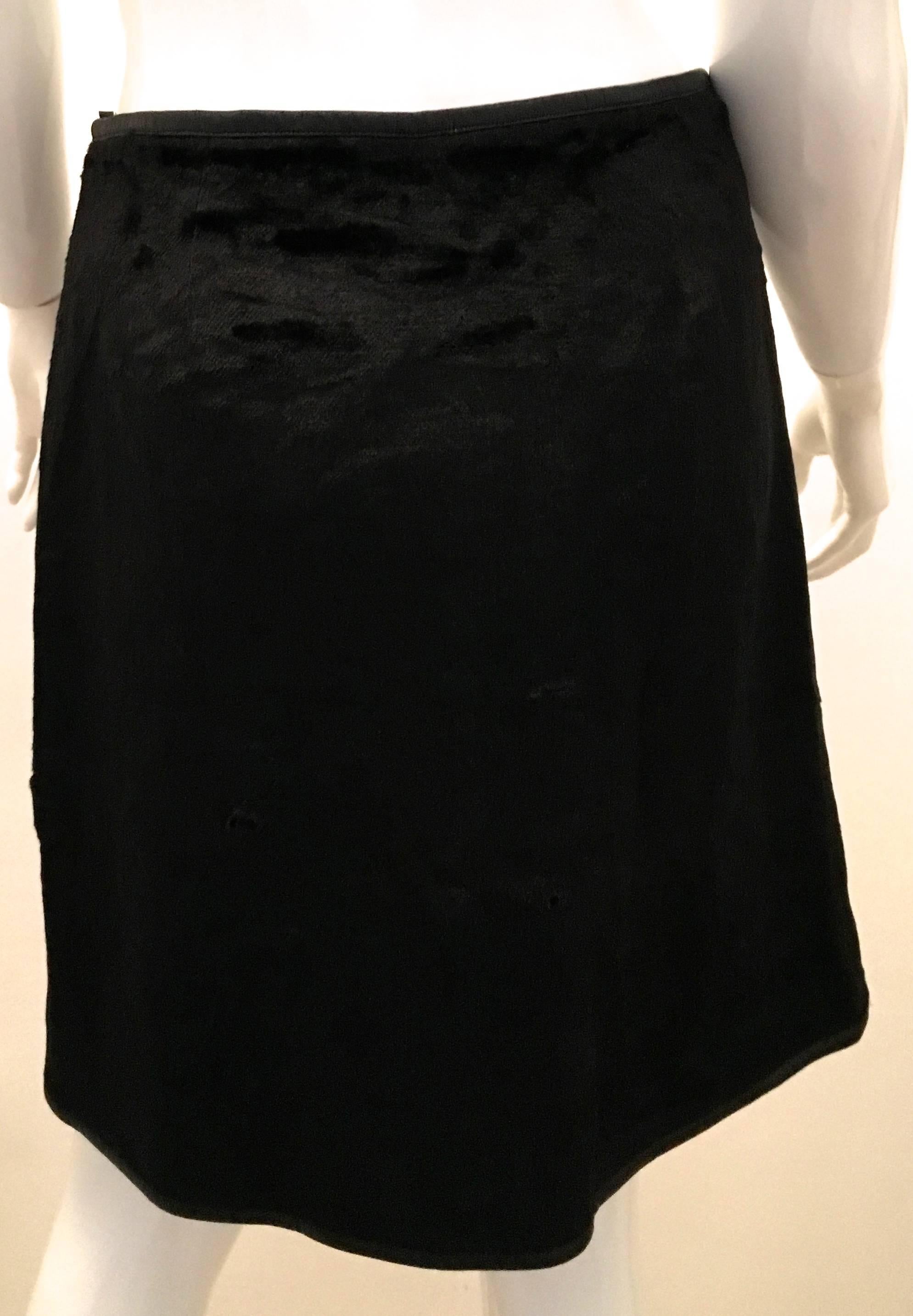 This Courreges 21 faux fur skirt is a great representation of everything happy and fun that Andre Courreges recommended. The skirt has not been altered and is marked a size 40 which fits like a US size 6. The waist measures 28 inches. The zipper