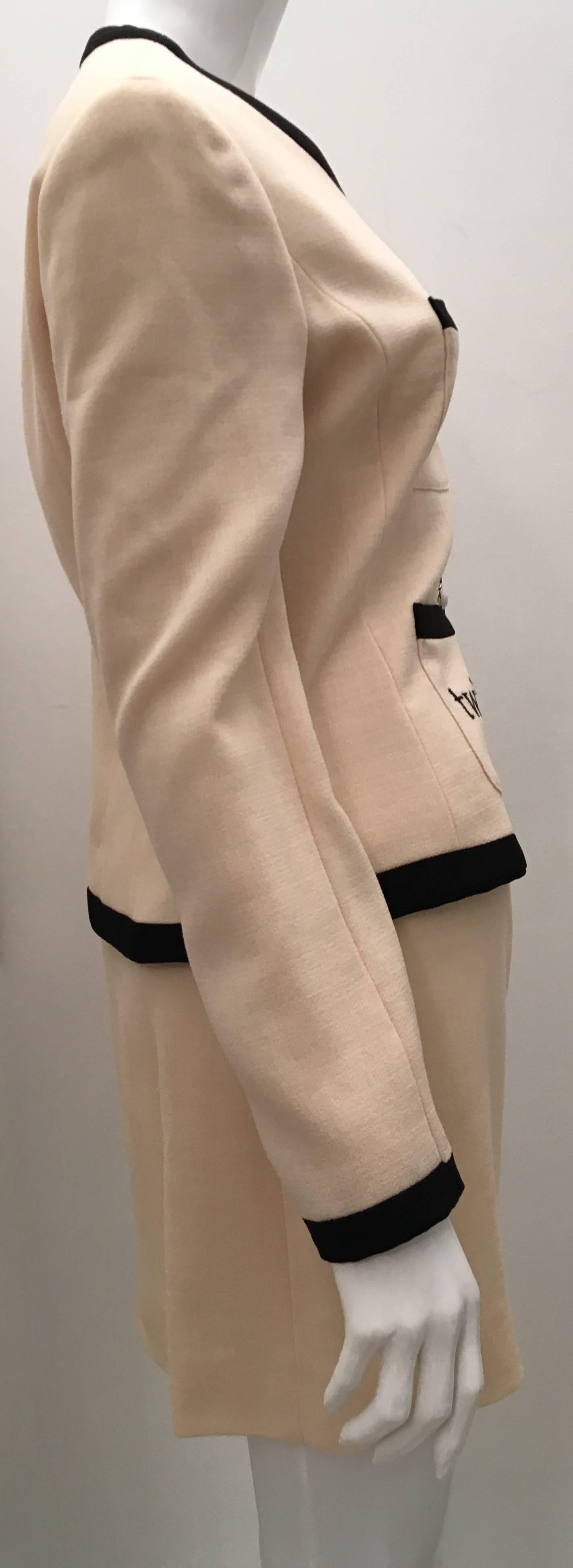 Presented here is a beautiful 2 piece beige suit from Moschino. The suit is from the 'Moschino Cheap and Chic' line. The jacket is a size 42 Italian, a size 38 French, a size 10 Great Britain, and a size 8 USA. The skirt is also a size 42 Italian, a