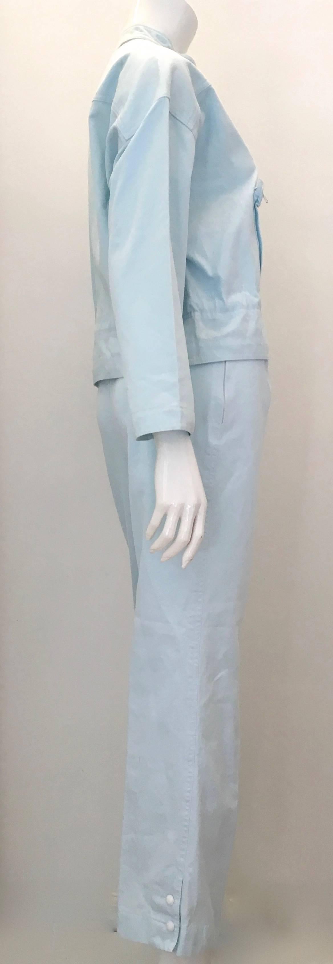 Presented here is a 2 piece light blue Courreges Pant suit. This is a casual day time Courreges ensemble from the 1980’s. It is meant to be worn together, but the jacket is fabulous on its own. The jacket is marked size ‘Medium’ and has a string tie