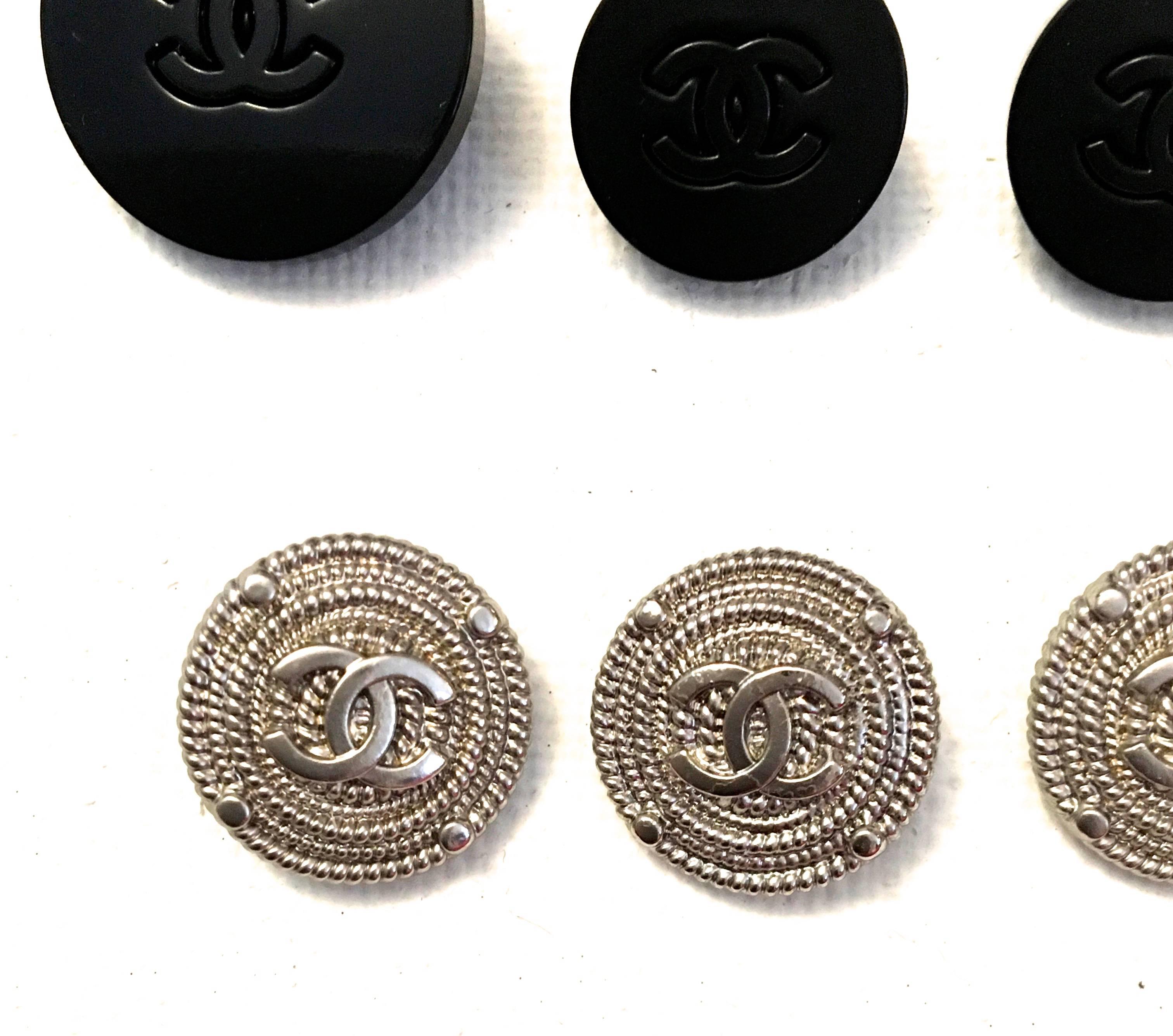 Black Set of Twelve Chanel Buttons 