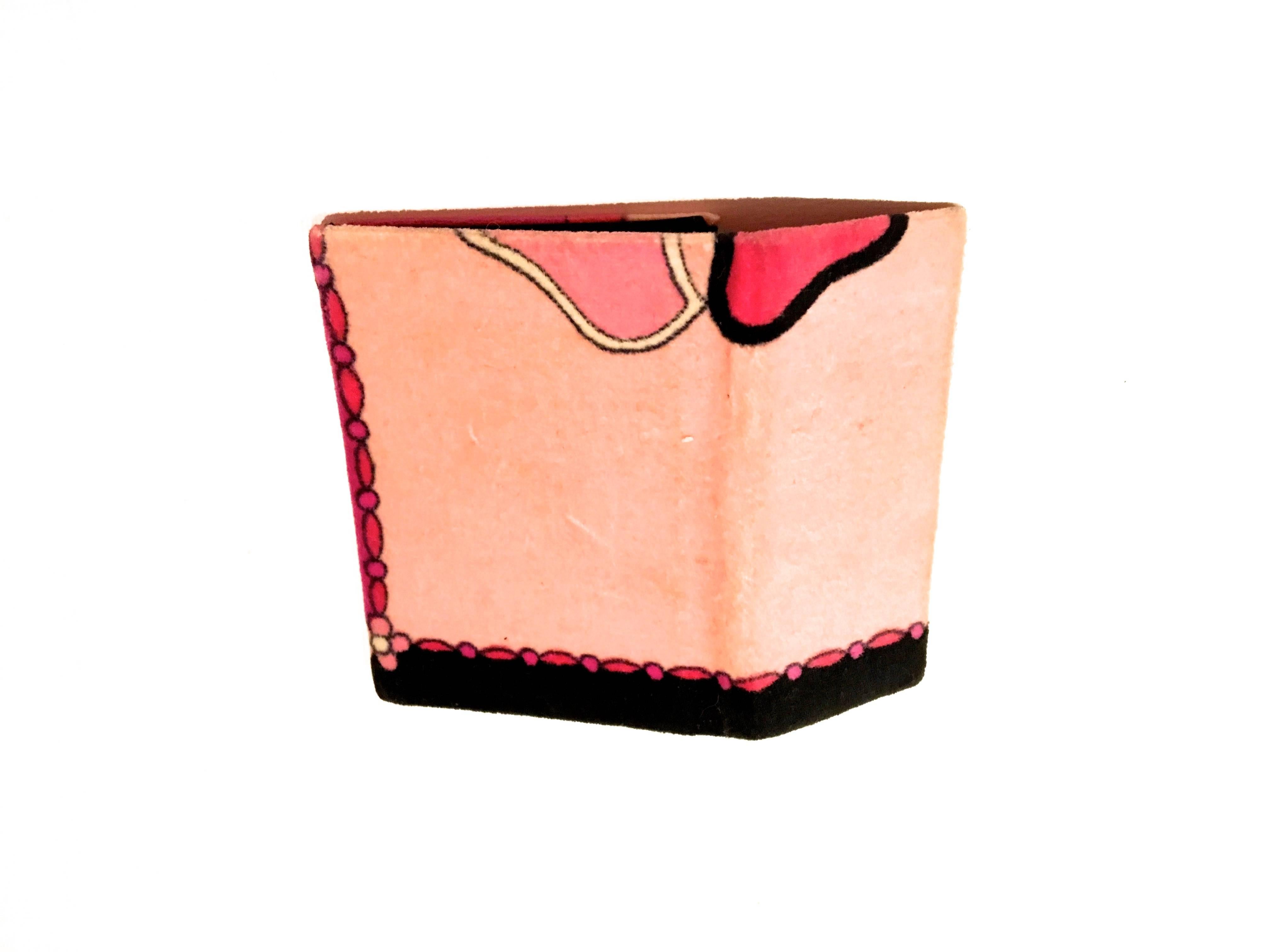 Presented here is an Emilio Pucci Coin Case with a snap closure lined in black silk. It is from the 1960's and the velvet fabric shows very little wear. Some very minor wear on the front where the pink is light and is in absolutely amazing