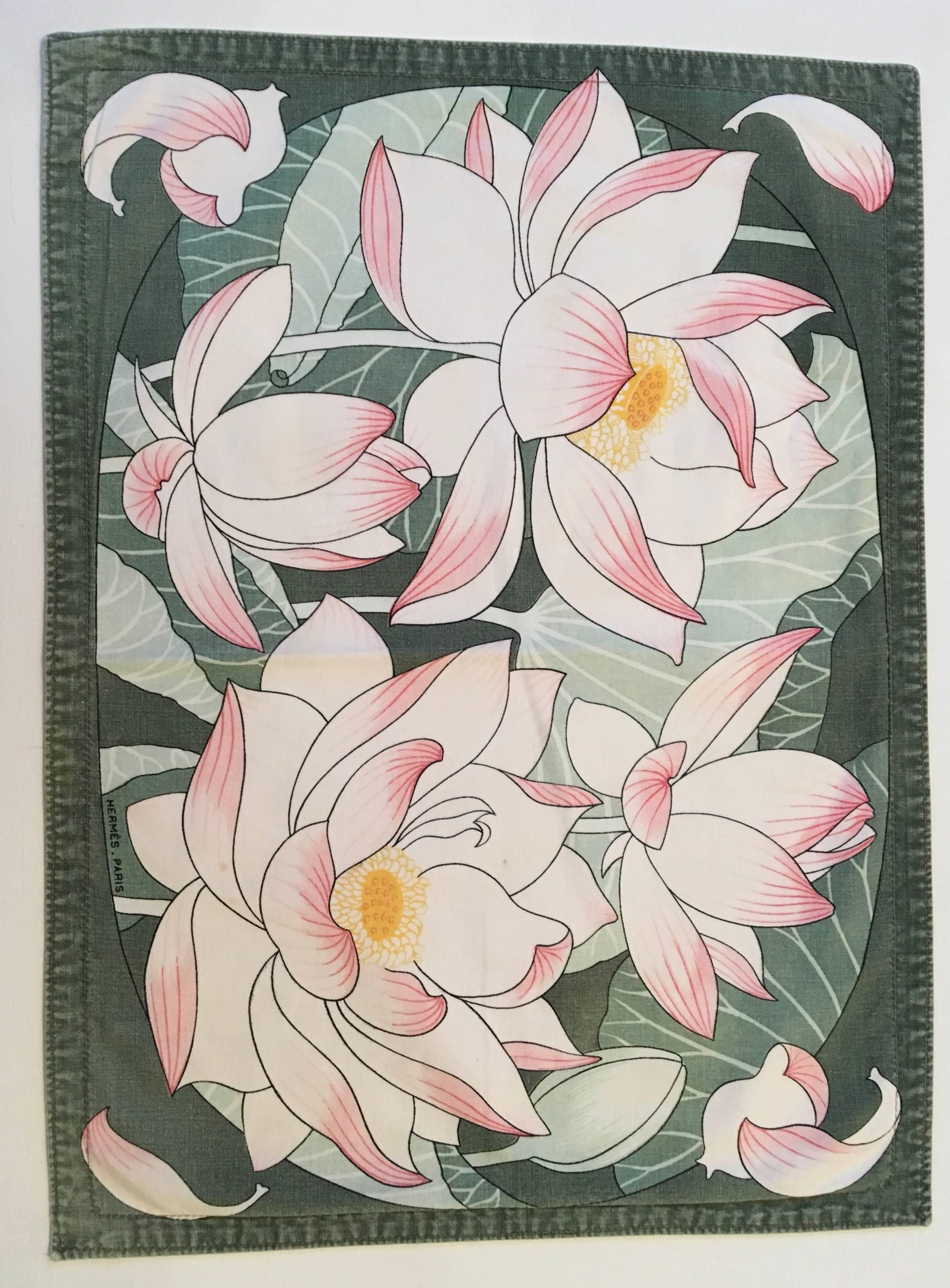 Presented here is a set of 4 Hermes placemats. These mats are made from 100% cotton. Each placemat is a floral print and each mat is the same design. The print is comprised of shades of colors of pink, white, green, and yellow. The beautiful