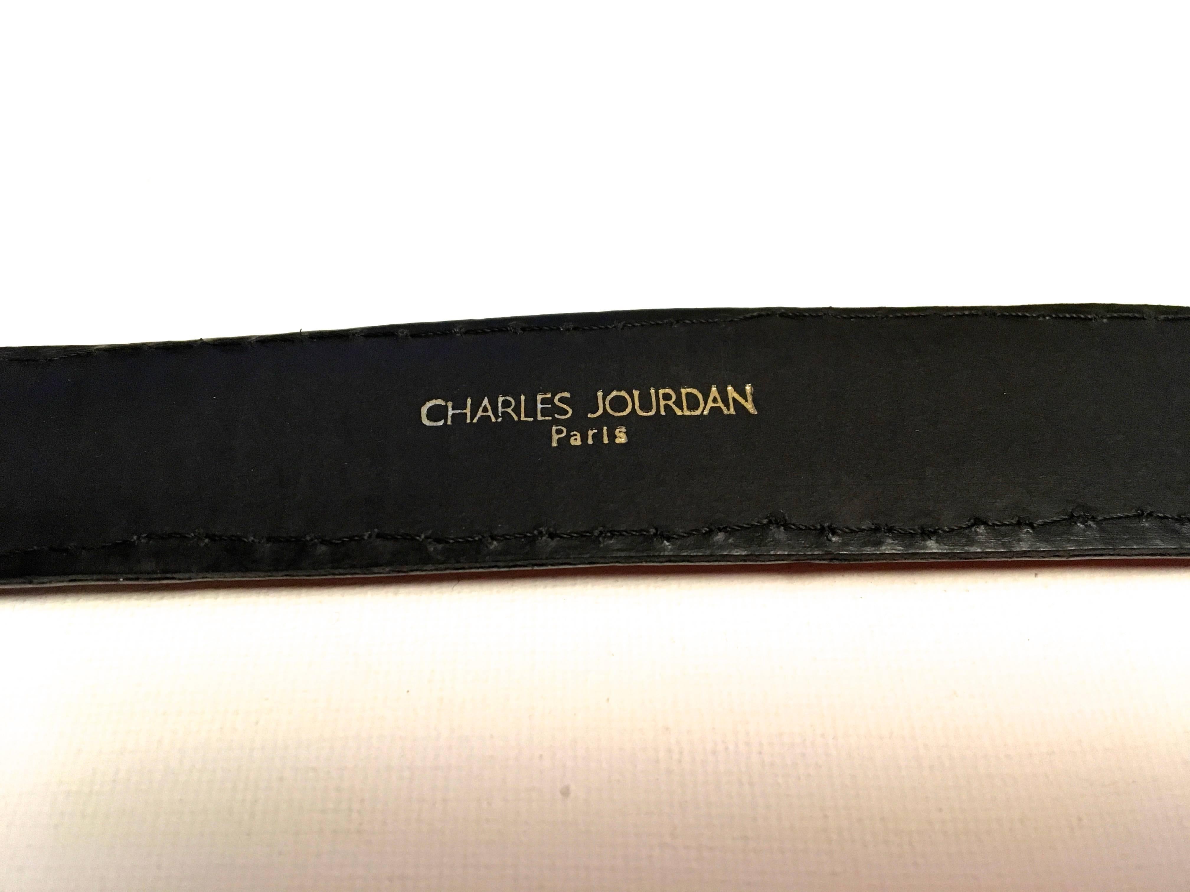 Presented here is a vintage Charles Jourdan belt. The belt is from the 1980's and is made from crocodile. The belt is black and has been fully restored by professionals to where the belt is almost brand new. The full restoration to the belt has made