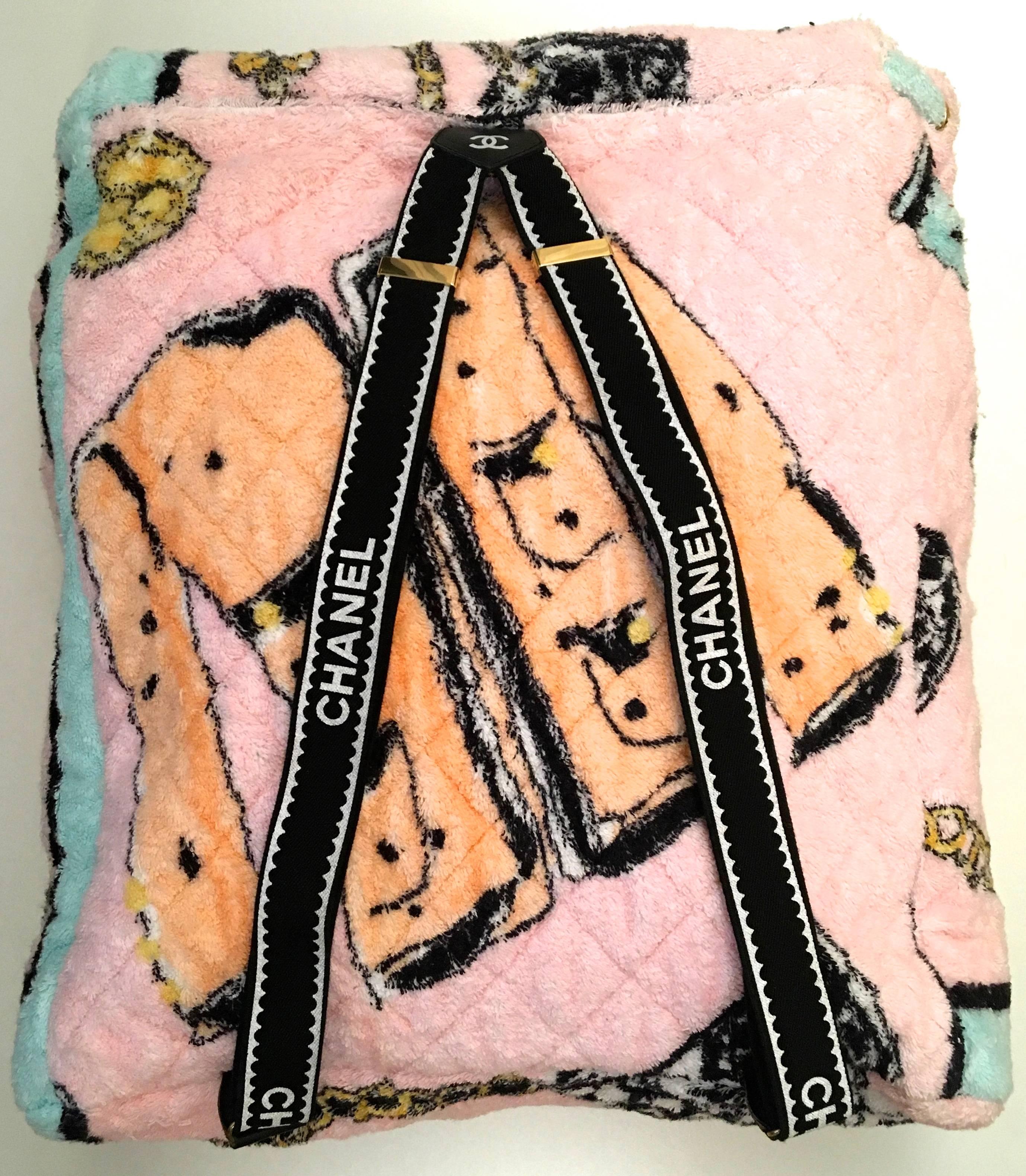 Presented here is a very rare terry cloth backpackfrom Chanel. This rare collector's item is from their Spring / Summer collection in 1994 and it appears to have never been used. The backpack is constructed of colorful terry cloth throughout and has
