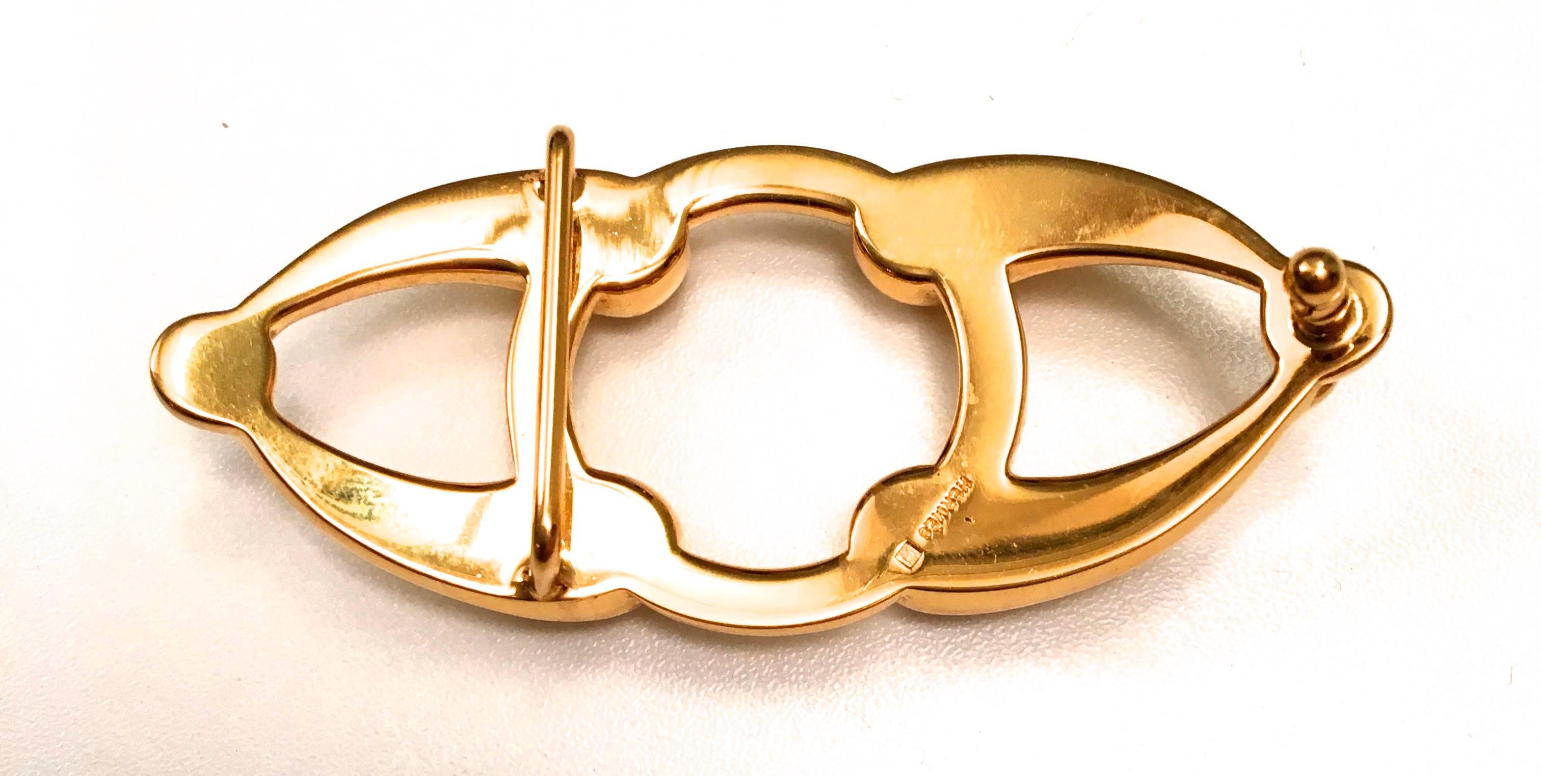Presented here is a rare gold tone buckle from Hermes. This beautiful vintage buckle is a vintage design that fits any standard Hermes belt. The buckle has been re-plated and is in near mint condition as if it was newly cast. The buckle measures