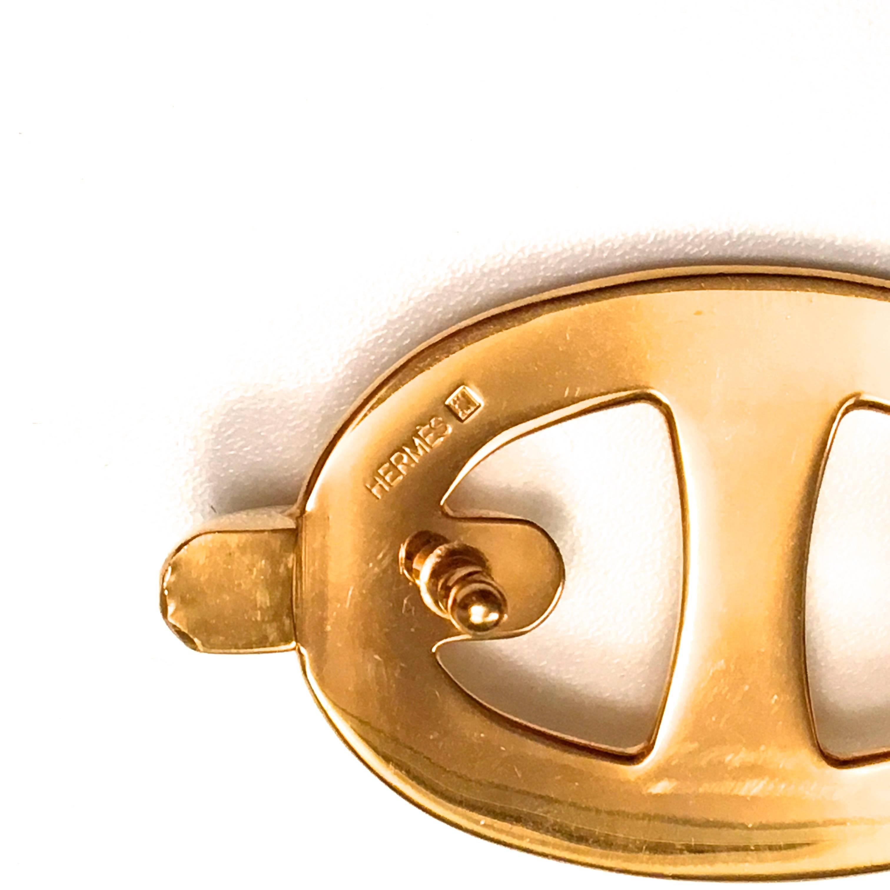 Presented here is a gold tone buckle from Hermes. This beautiful vintage buckle is a vintage design that fits any standard Hermes belt. The buckle has been re-plated and is in near mint condition as if it was newly cast. The buckle measures 3 inches