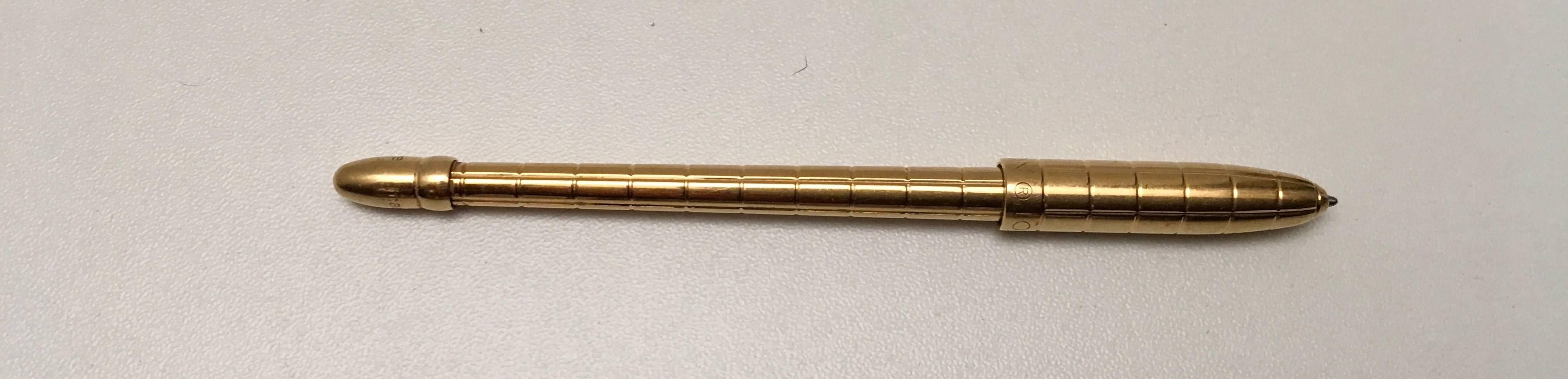 Presented here is a beautiful ballpoint pen from Louis Vuitton. This ballpoint pen is the standard agenda size and is comprised of a gold brass finish design. The pen has a twist to open the tip for use. A magnificent pen that is great for all