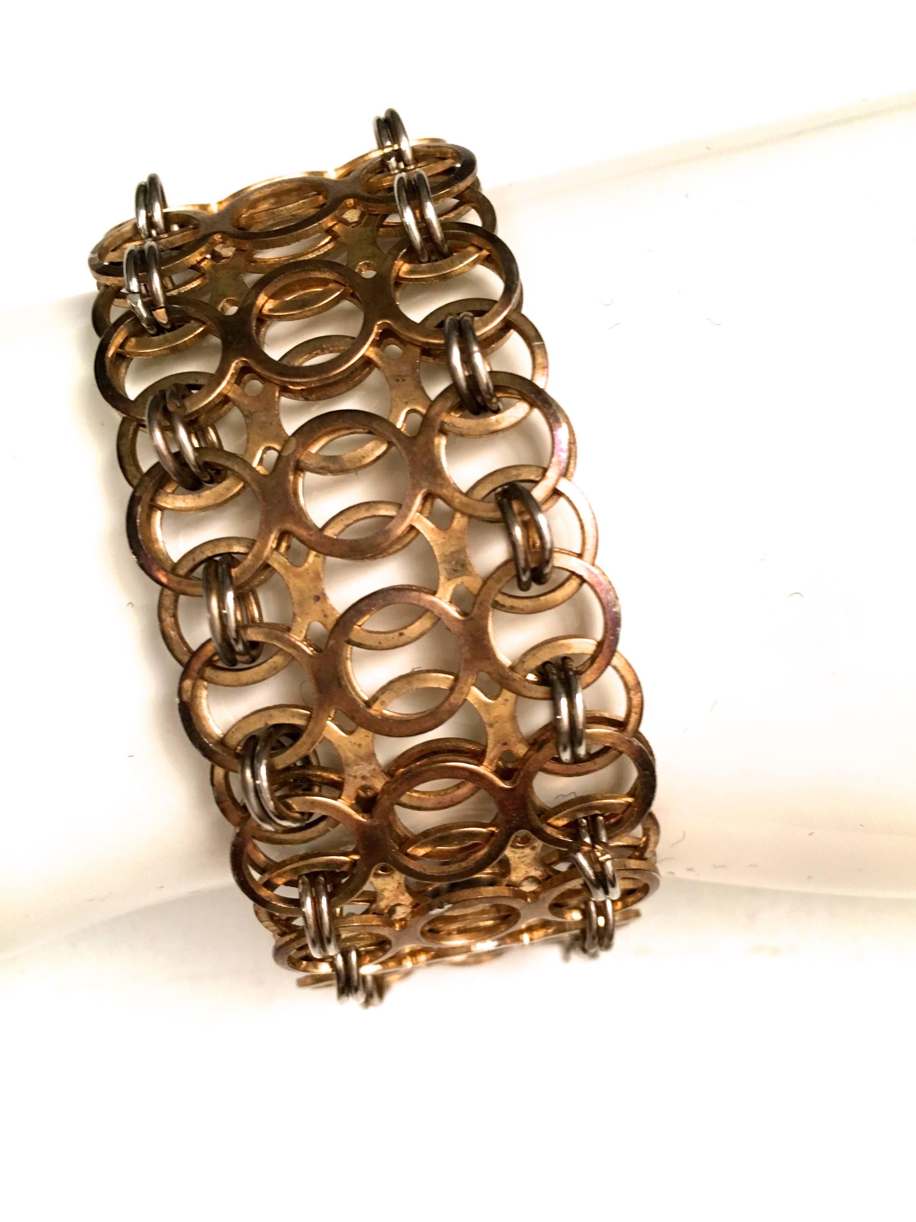 Presented here is a gorgeous vintage bracelet from Paco Rabanne. The bracelet is from the late 1960's early 1970's. The bracelet is made from connected links and rings with extreme attention to detail and design. The bracelet is crafted and designed