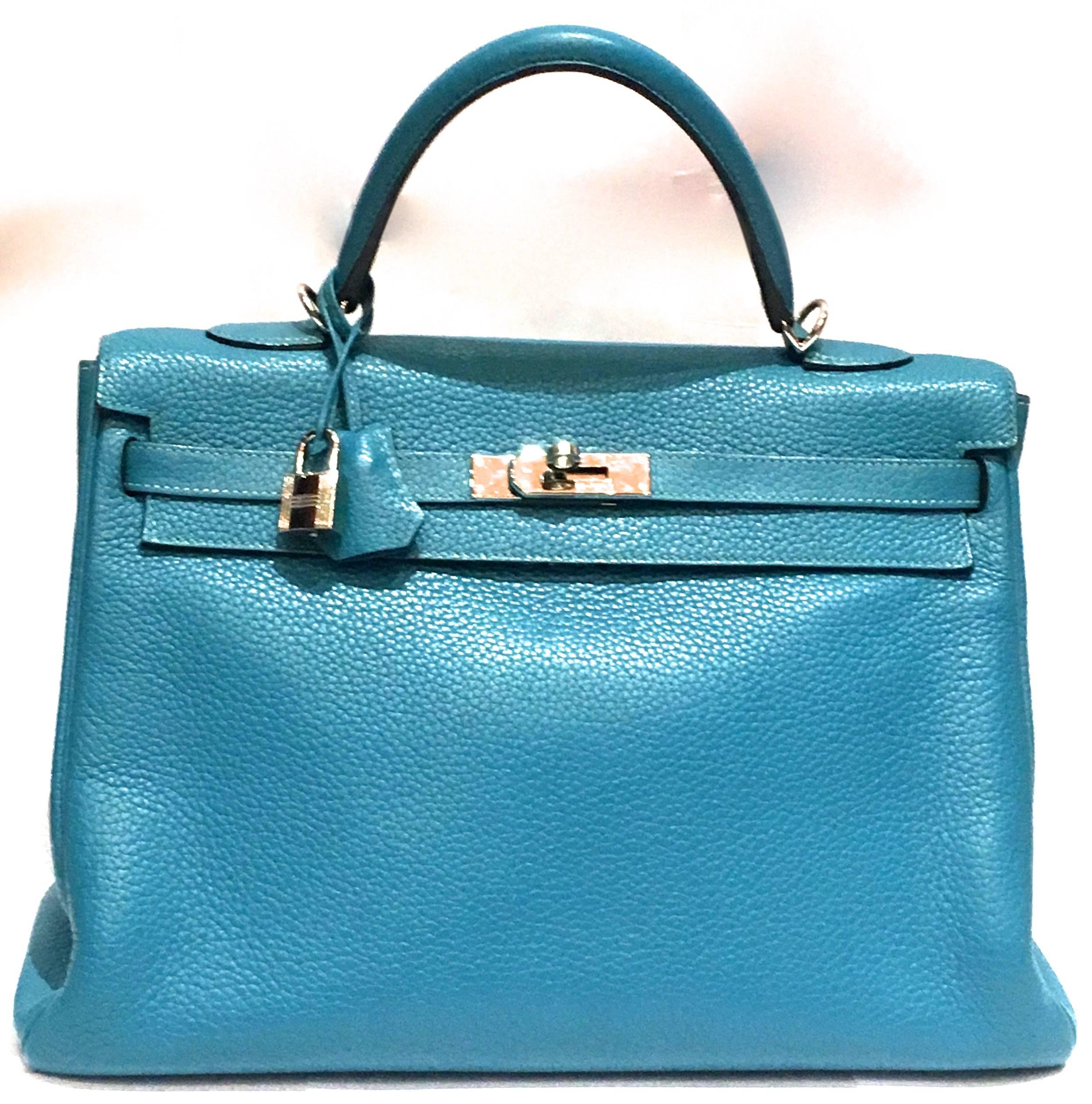 Presented here is a gorgeous handbag from Hermes Paris. This gorgeous handbag is the classic 'Kelly' styling which was made famous because Grace Kelly was known for the style being her favorite. This particular bag is made with clemence style
