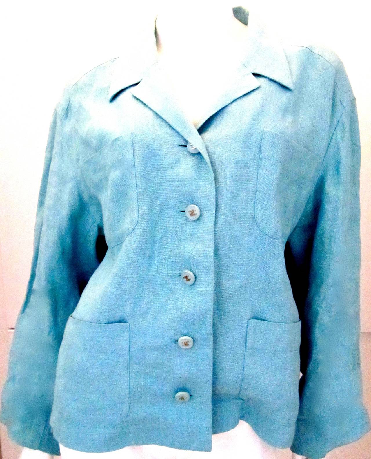 Chanel Light Aqua Blue Linen Jacket. Size 36. Gorgeous color of linen that is great for various occasions and weather. In excellent condition. Vintage piece from the Spring of 1996 line. Beautiful piece that can be worn with sleeves rolled up or