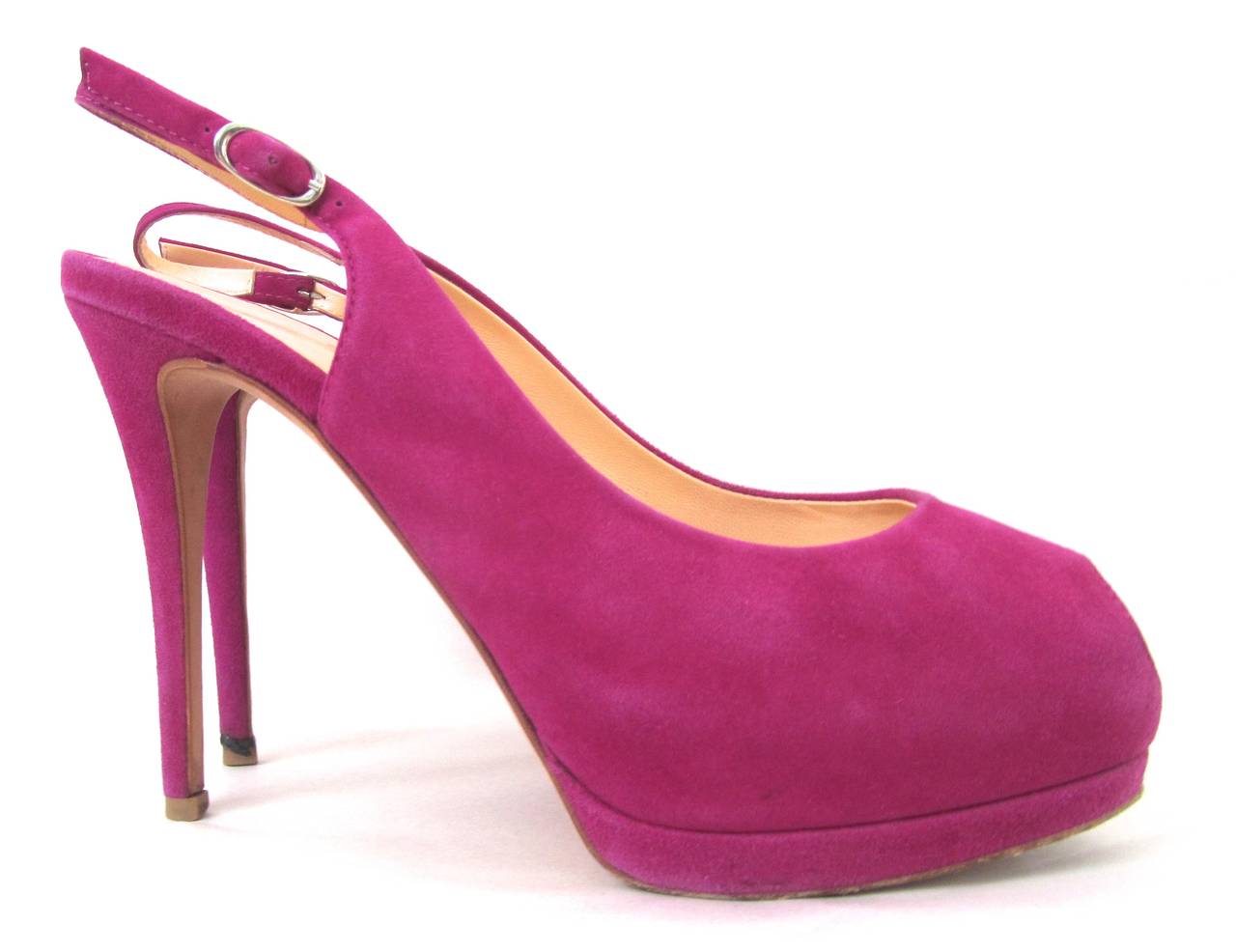 Giuseppe Zanotti pink fuchsia suede pumps with heel strap. Size 37. Toeless. Gorgeous shoes that with a timeless look. Finely crafted soft suede fabric. The heals are 4.5 inches.
