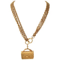 Gold Tone Chanel Triple Chain Necklace with Iconic Purse Pendant