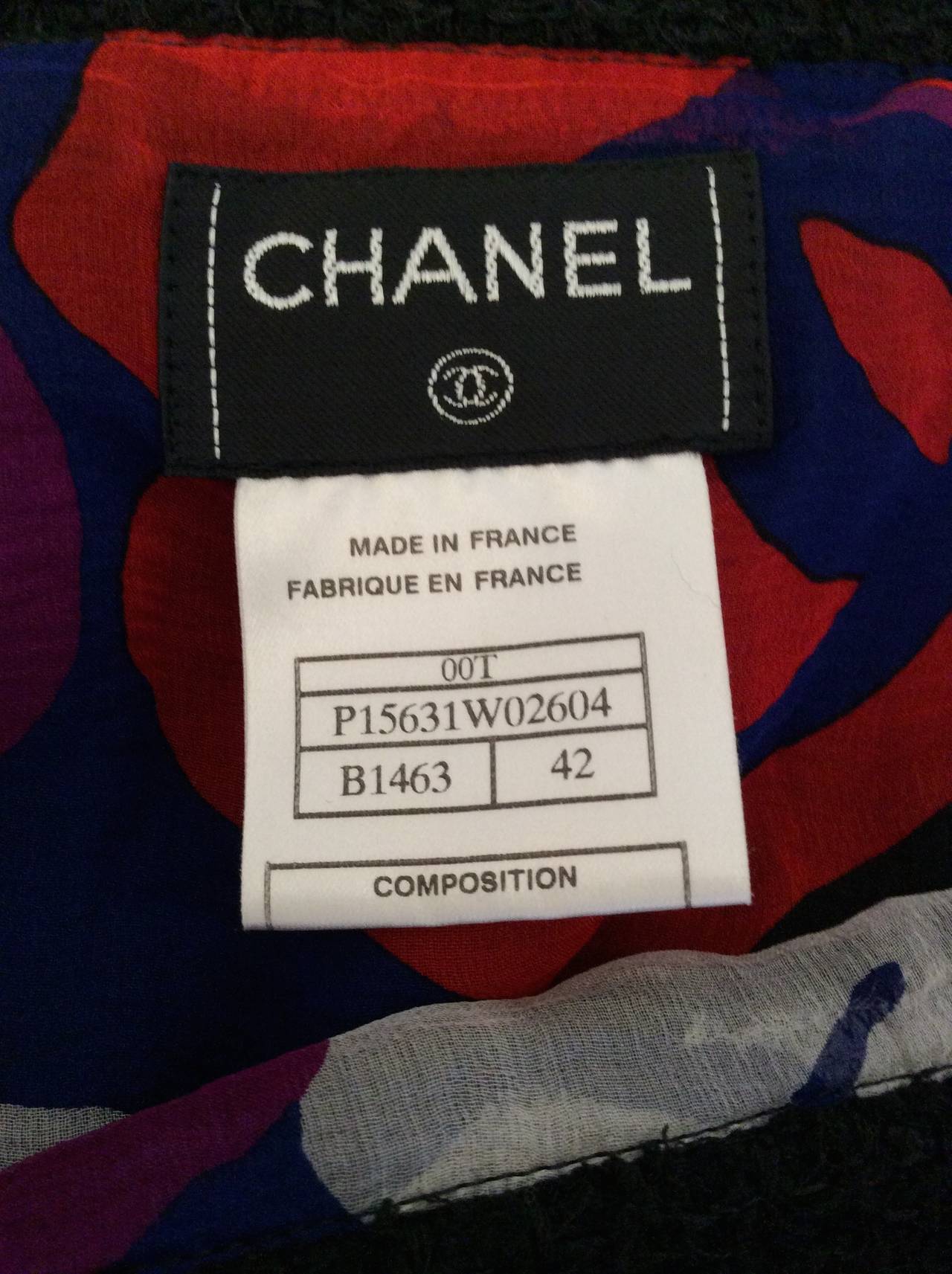 MAGNIFICENT Chanel 3 Piece Black Boucle with Silk Suit For Sale 3
