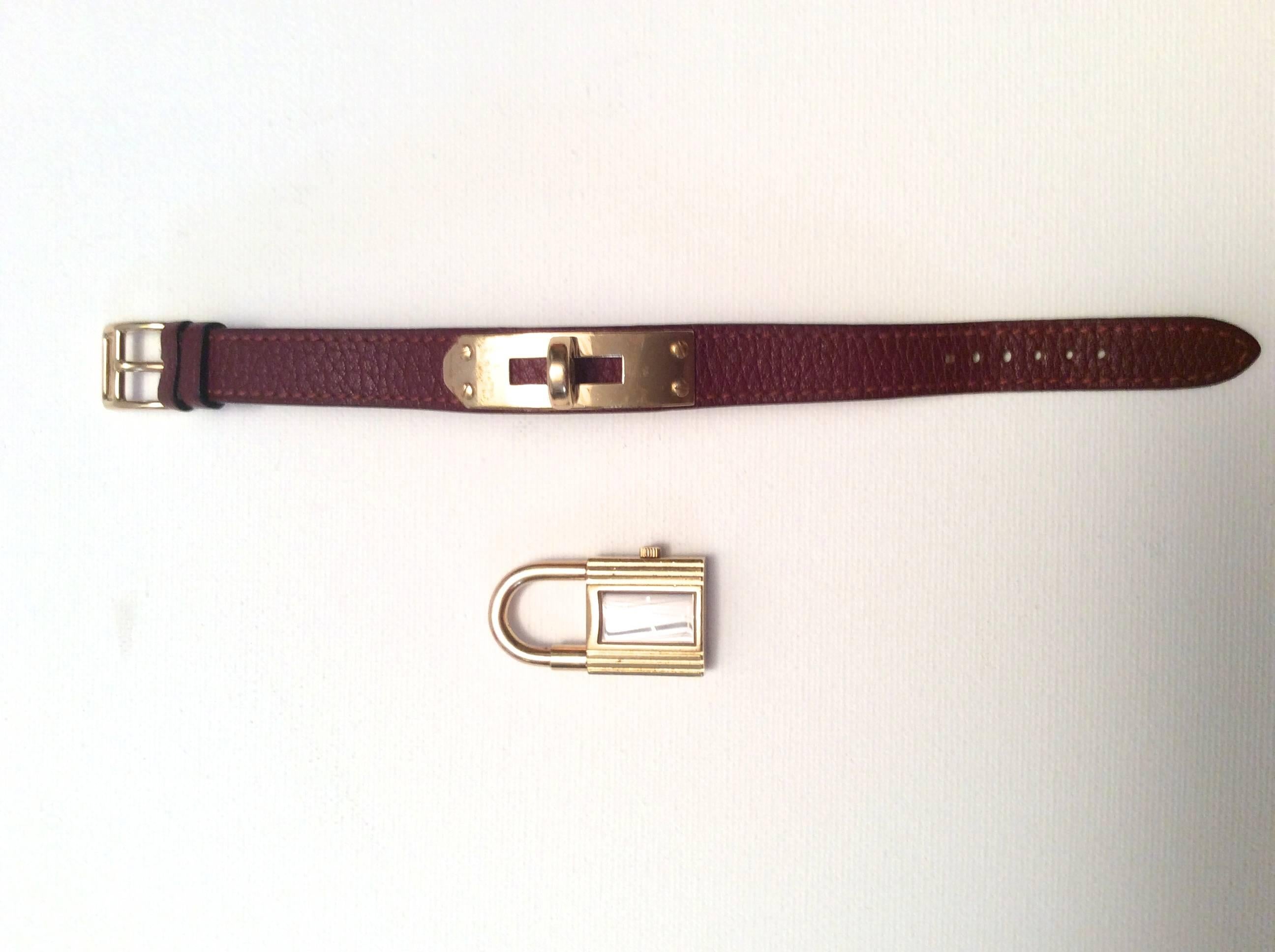 Hermes Kelly Watch - Gold Tone - Burgundy with Matching Strap In Excellent Condition For Sale In Boca Raton, FL