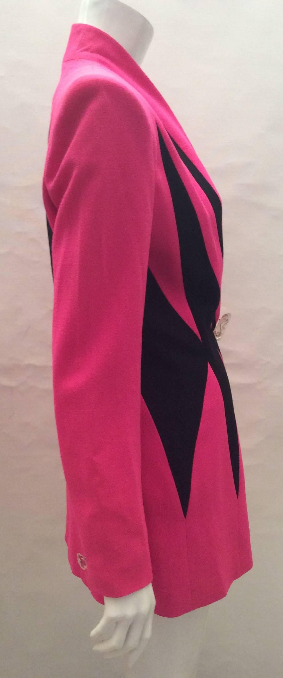 Catherine Gerard at 35 Chaussee D'Antin was one of the most frequented stores in the 1980's known for its fabulous fashion forward beautiful couture style. This magnificent hot pink jacket with black geometric designs around it is extremely