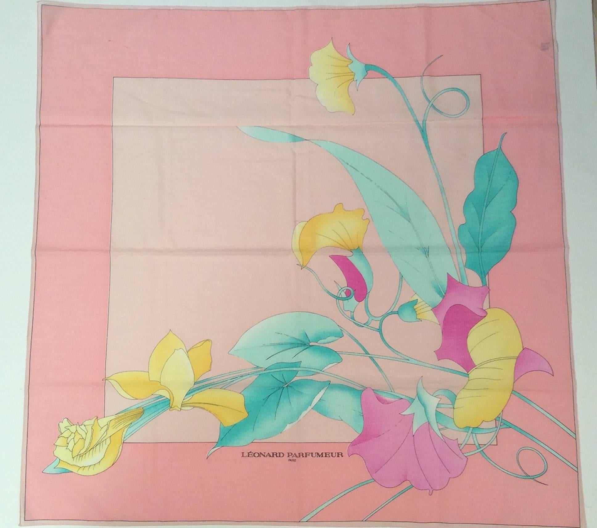 Here is a vintage Leonard scarf from the 1970's. The scarf is cotton has is pink with a floral design on it. The dimensions of the scarf are 30 inches by 30 inches. The scarf is in excellent condition. A gorgeous example of Leonard that is