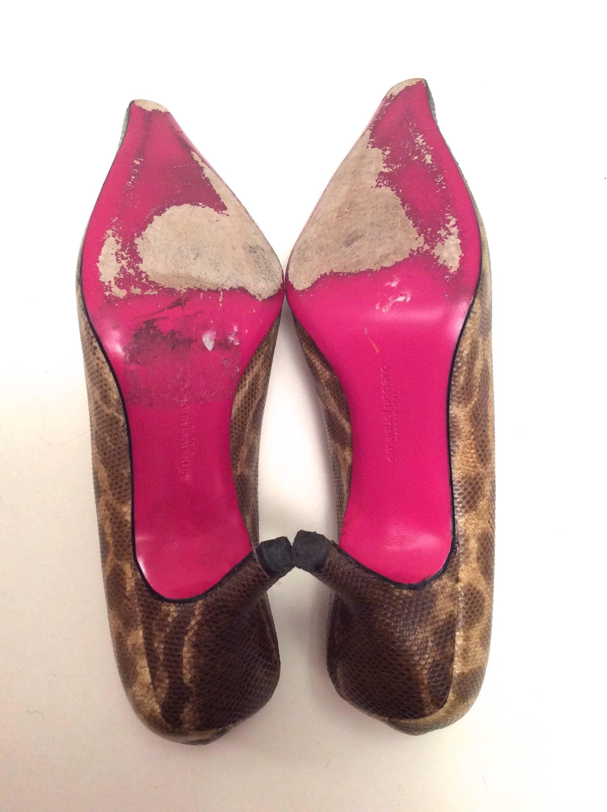 This pair of Emanuel Ungaro Paris shoes is from the 1980's and is in excellent condition. They have only been worn a few times. They are a size 7 and fit like a 7. They run a tad small. The sole has a minor bit of wear. The exterior of the shoe is a
