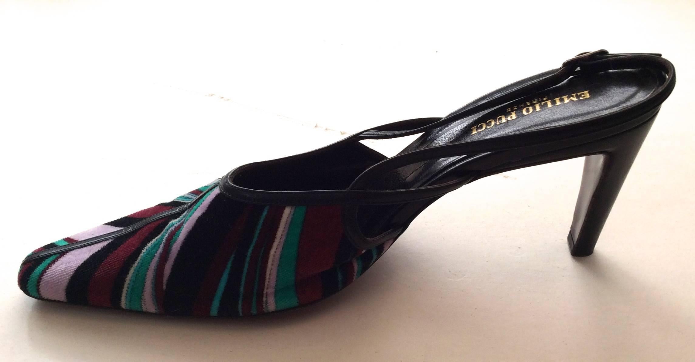 Emilio Pucci Slingback pumps. Size 37. Magnificent slingback style pumps that have a velvet fabric on the exterior with a definitively Emilio Pucci design on the exterior of the shoe. There is a black leather on the rest of the shoe. A remarkable