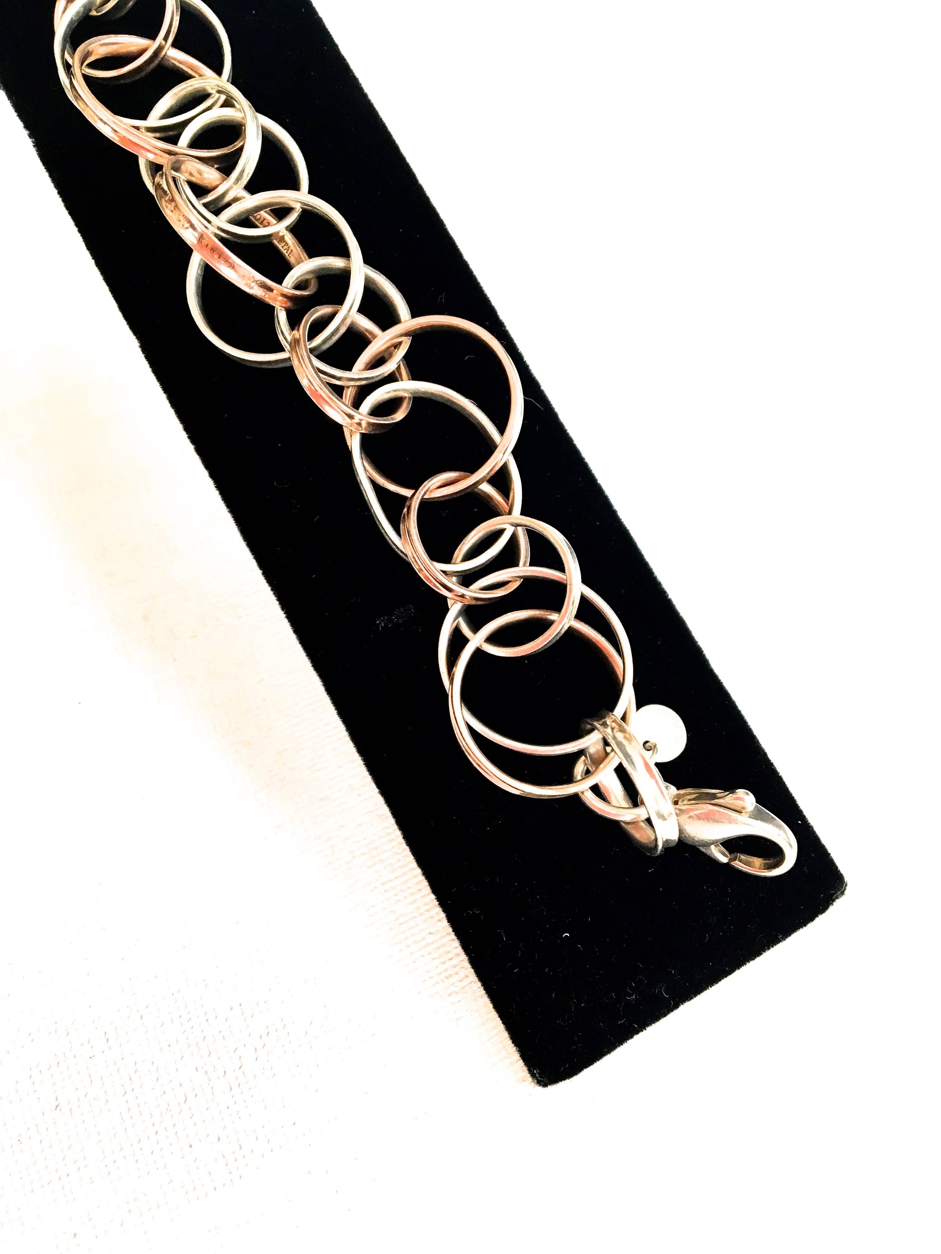 Women's or Men's Tiffany 1837 Interlocking Circles Bracelet - Rubedo Metal & Silver For Sale