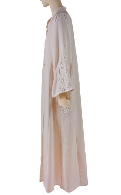 Fabulous 70s Josefa kaftan Mexico. This is a great kaftan,beige cotton fabric with satin fringes attached on front and sleeves as well as apliques on front.Kaftan has metal zipper closure on front,Josefa label inside. No odors tears or stains,very