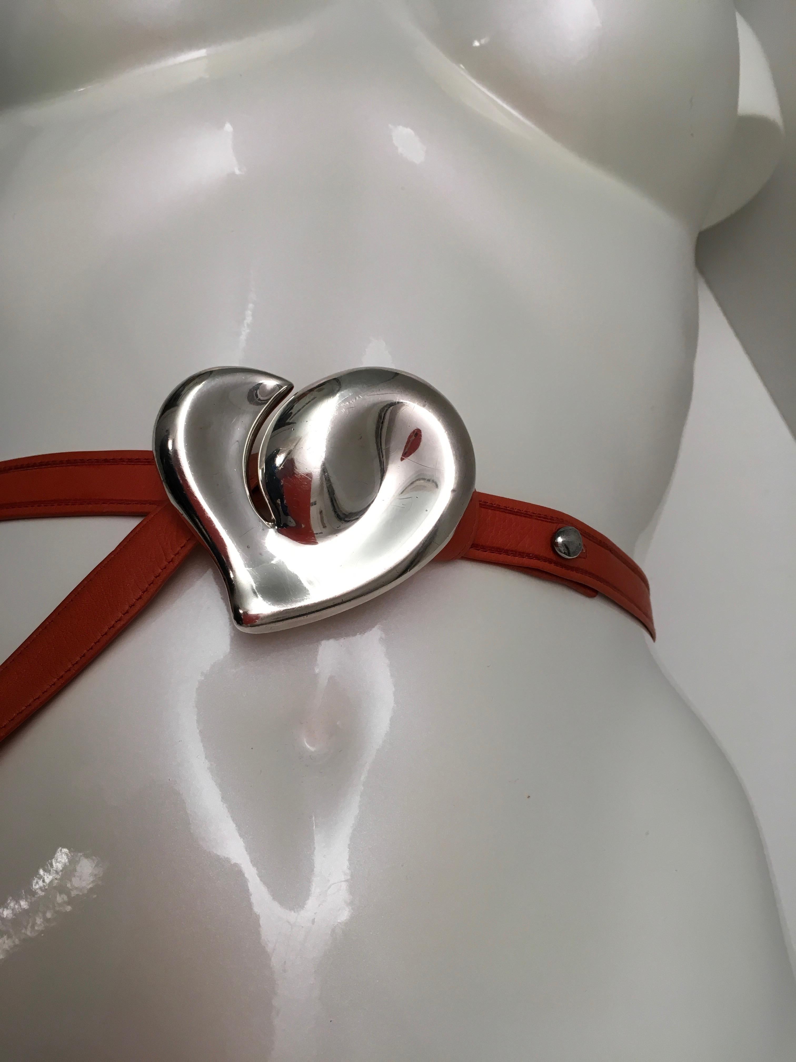 Presented here is a magnificent Elsa Peretti for Tiffany and Co. sterling silver heart buckle with 2 original straps from 1978. The sterling silver heart measures 2.5 inches across and 2.5 inches high. The weight is 45.5 grams. The belt is signed on