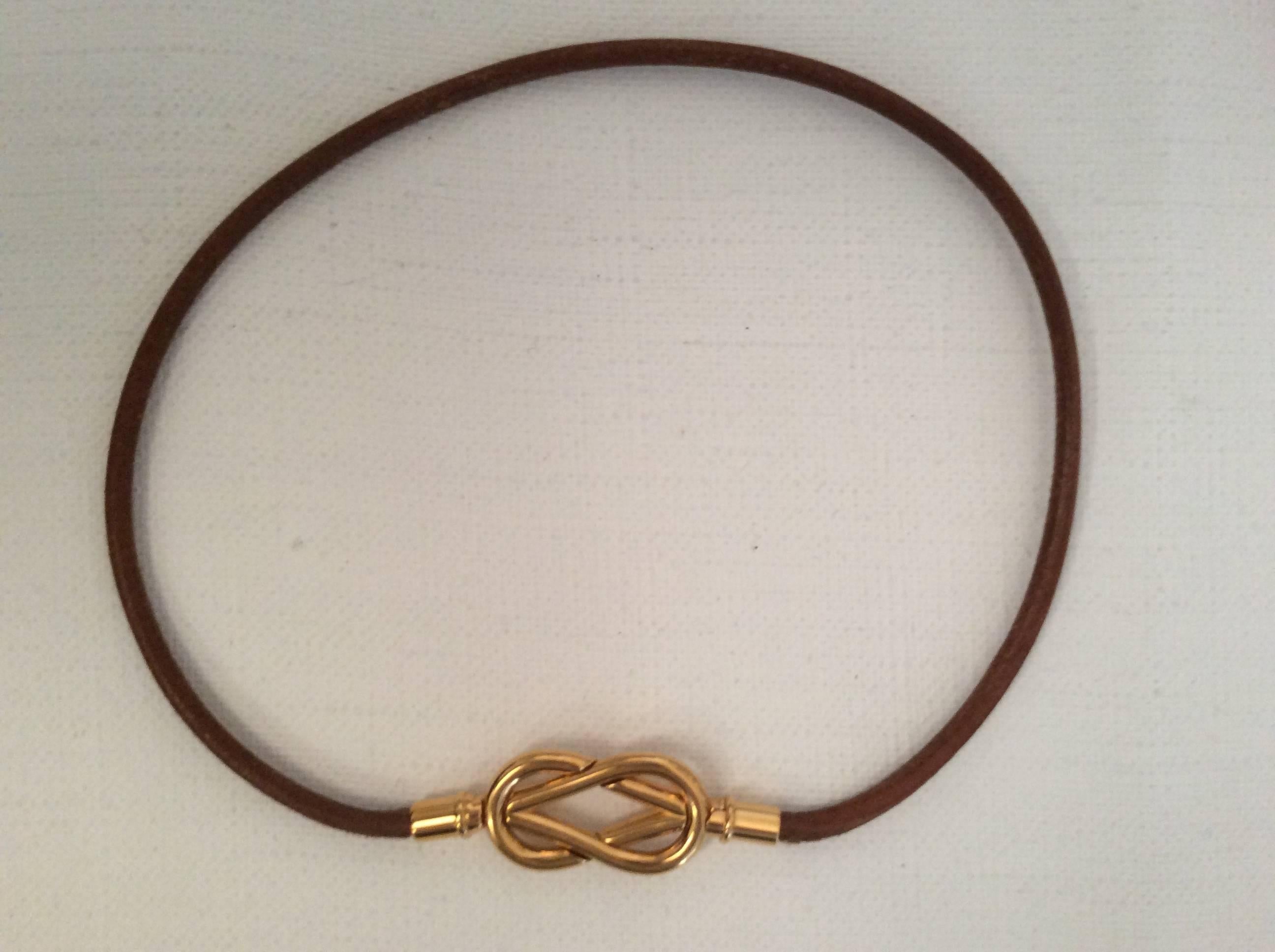 Women's Hermes Gold Tone Love Knot Necklace